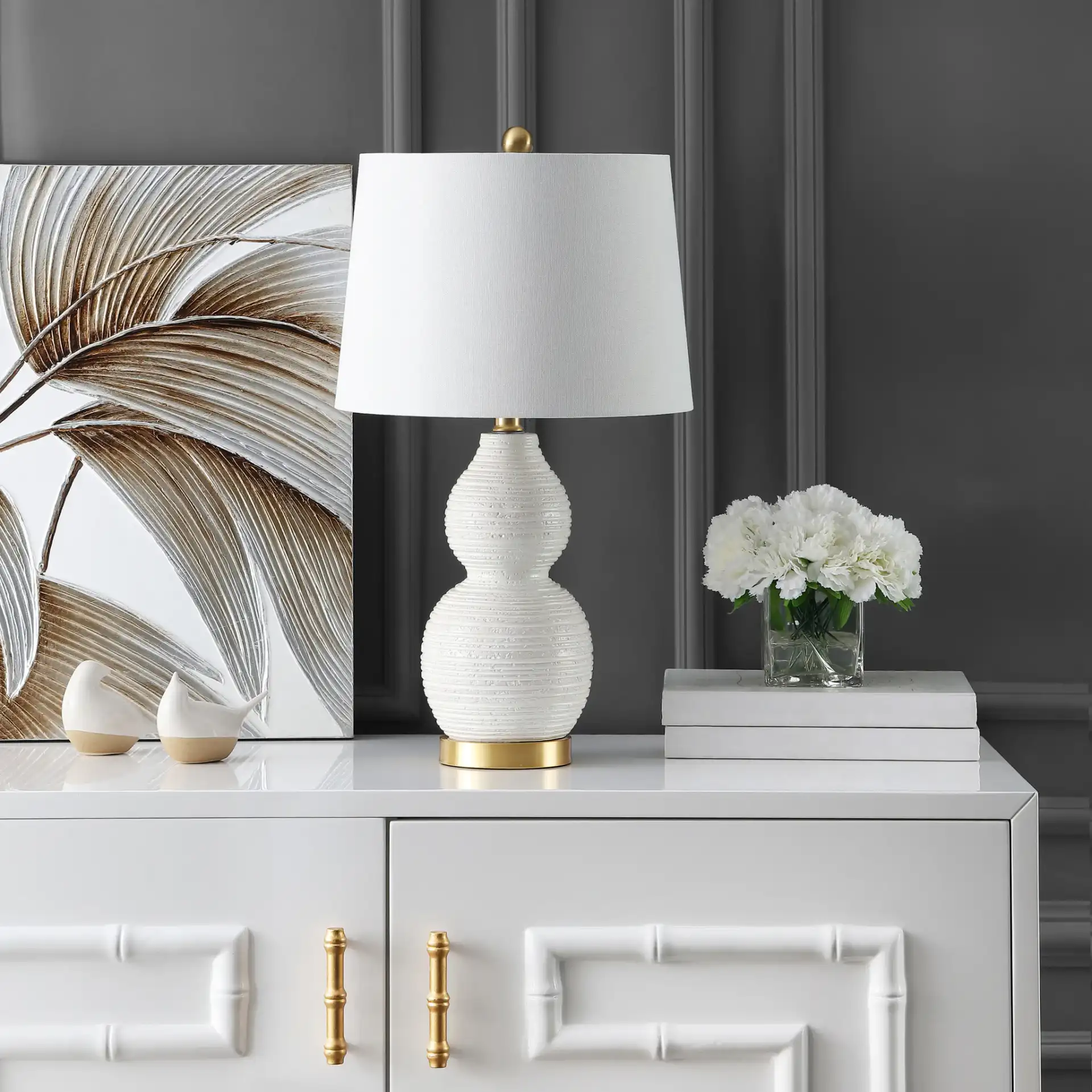 Darsa Table Lamp in White in a styled room