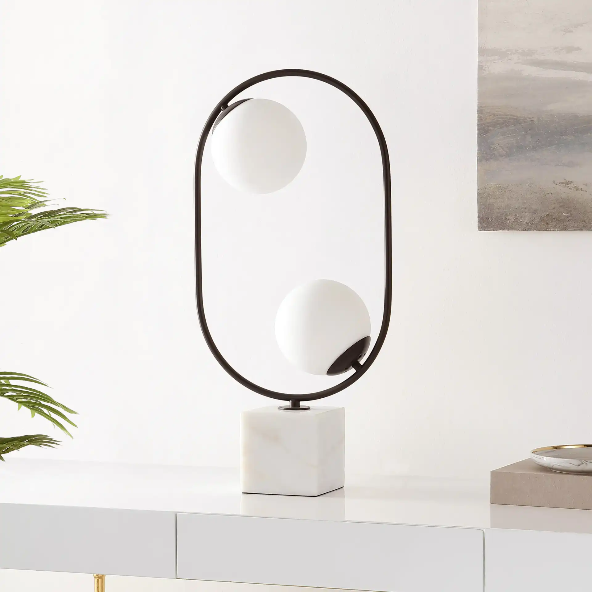 Imrie Table Lamp in White / Black in a styled room