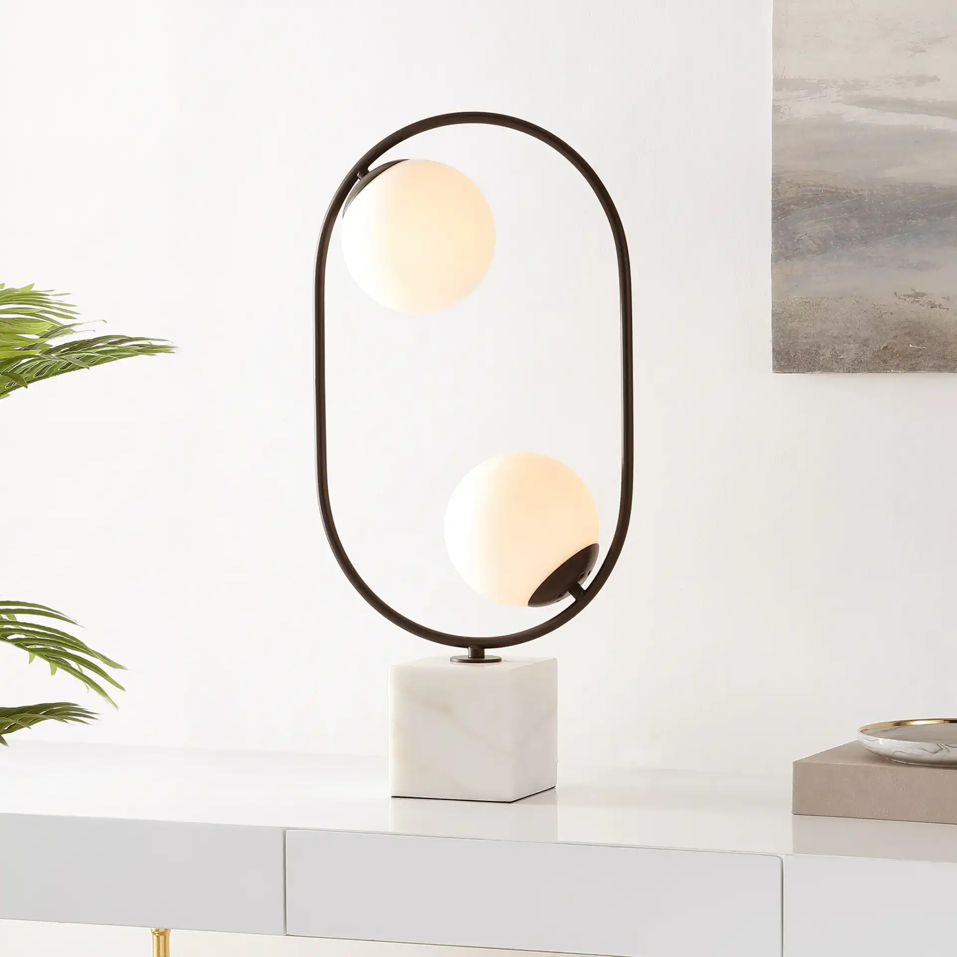 Imrie Table Lamp in White / Black in a styled room