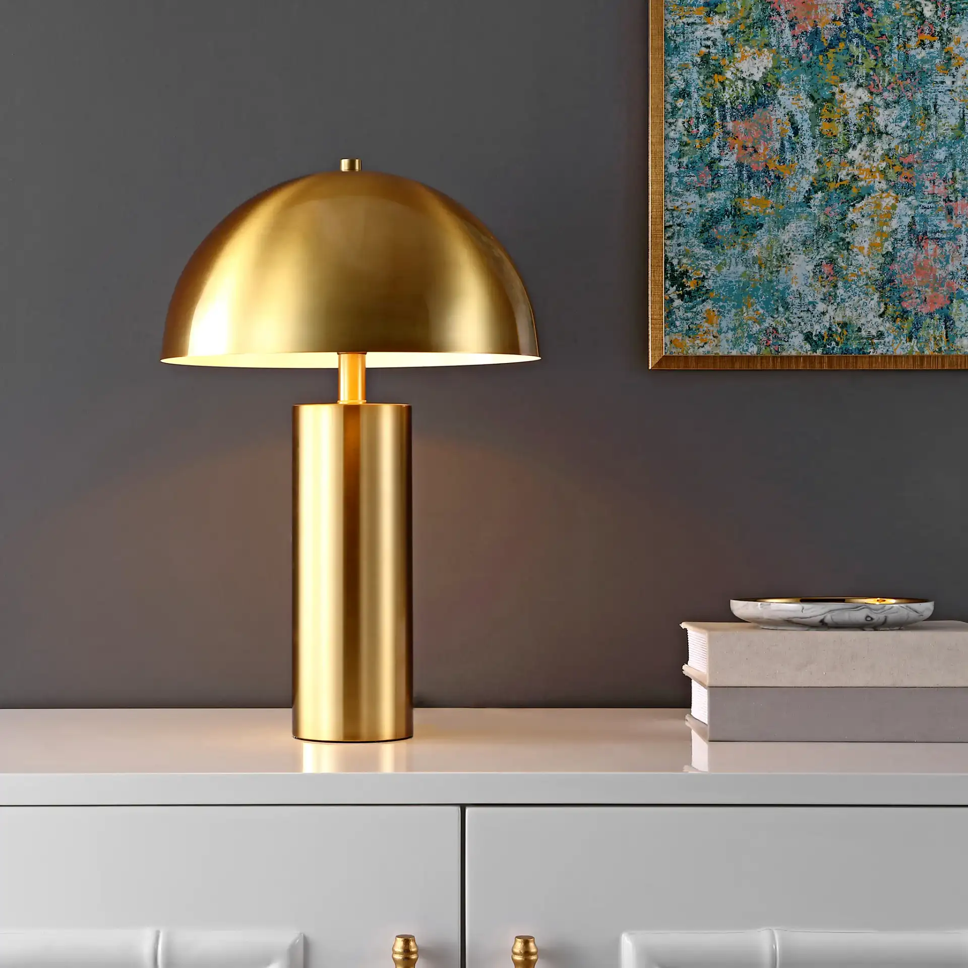 Iria Table Lamp in Gold in a styled room
