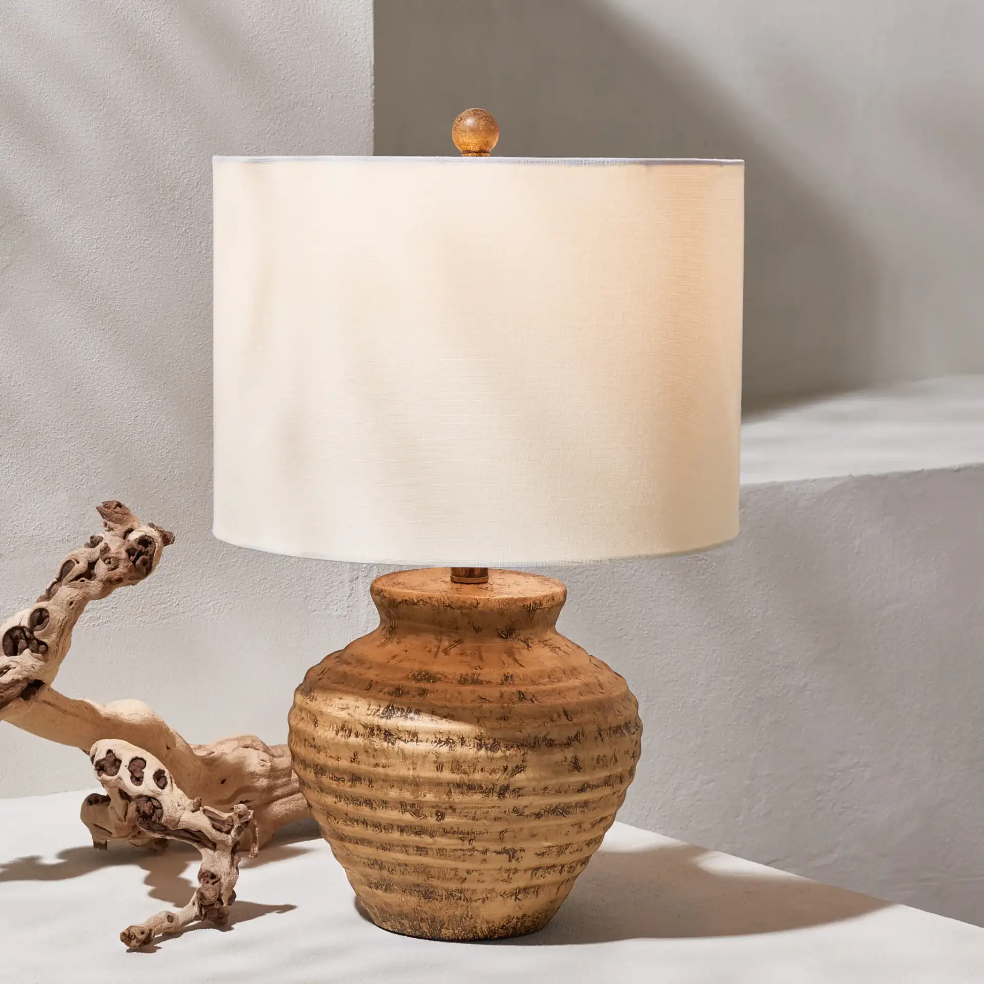 Kamryn Table Lamp in Brown in a styled room