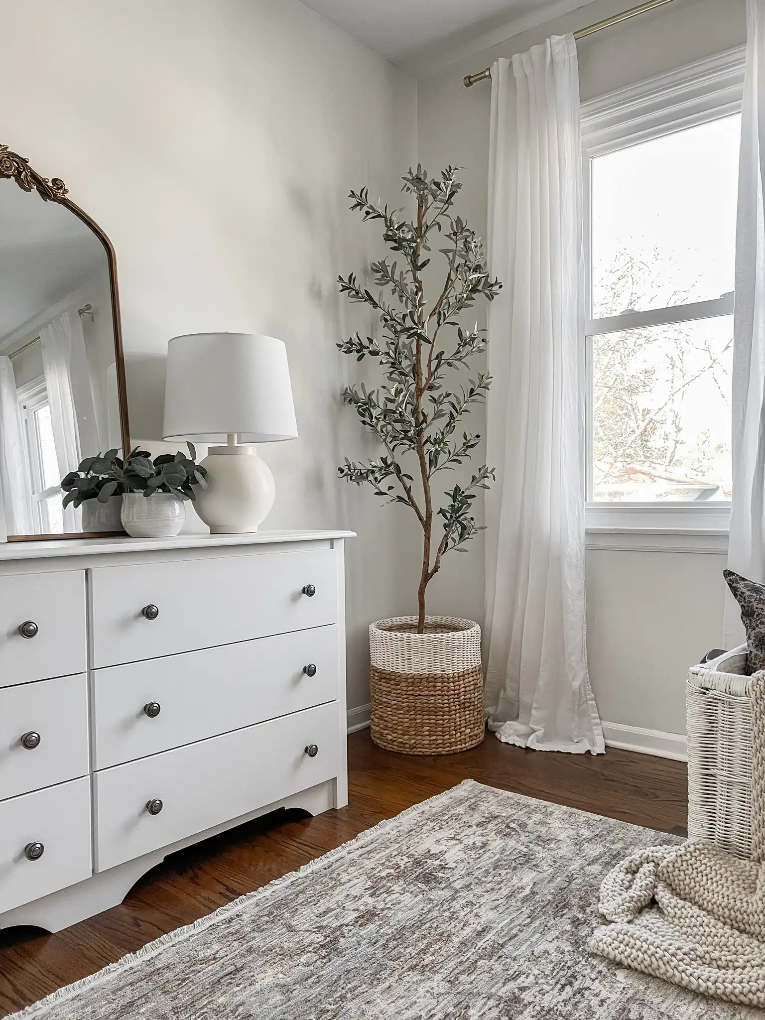 Lemeni Table Lamp in Cream in a styled room