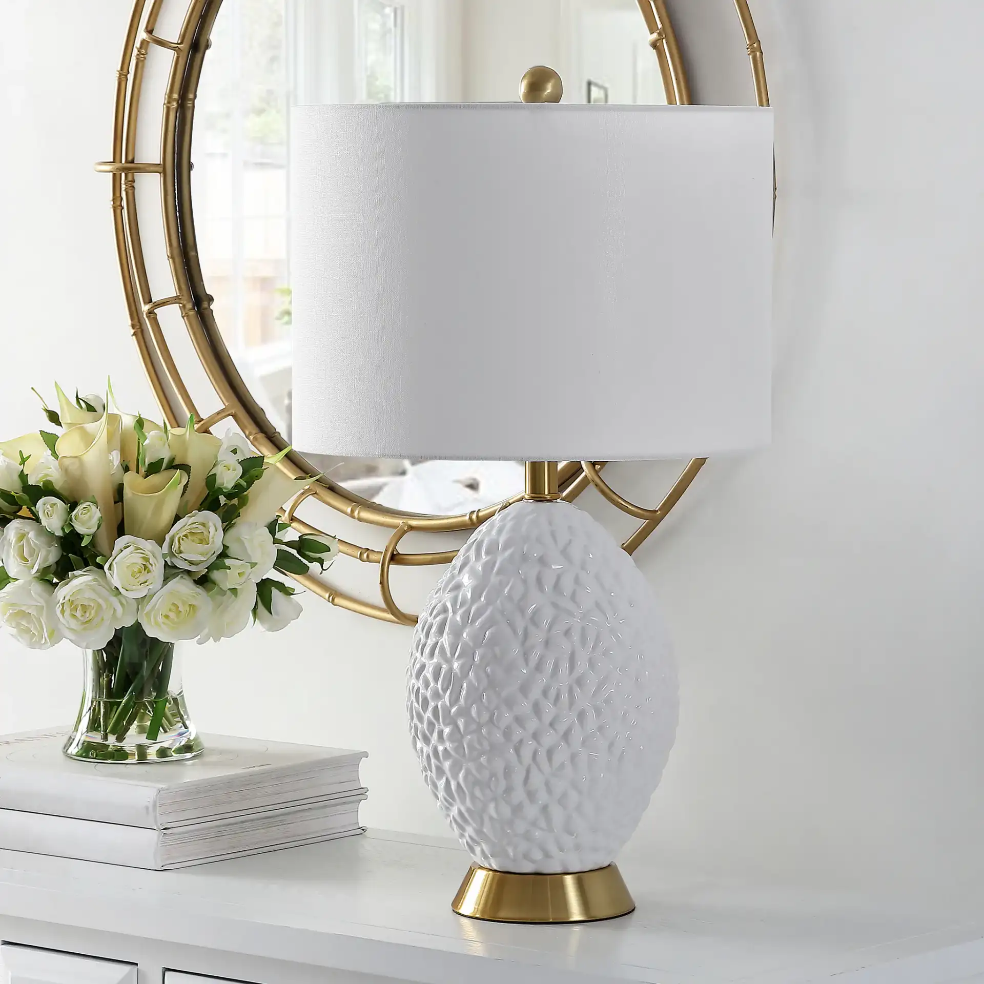 Kimli Table Lamp in White / Brass in a styled room