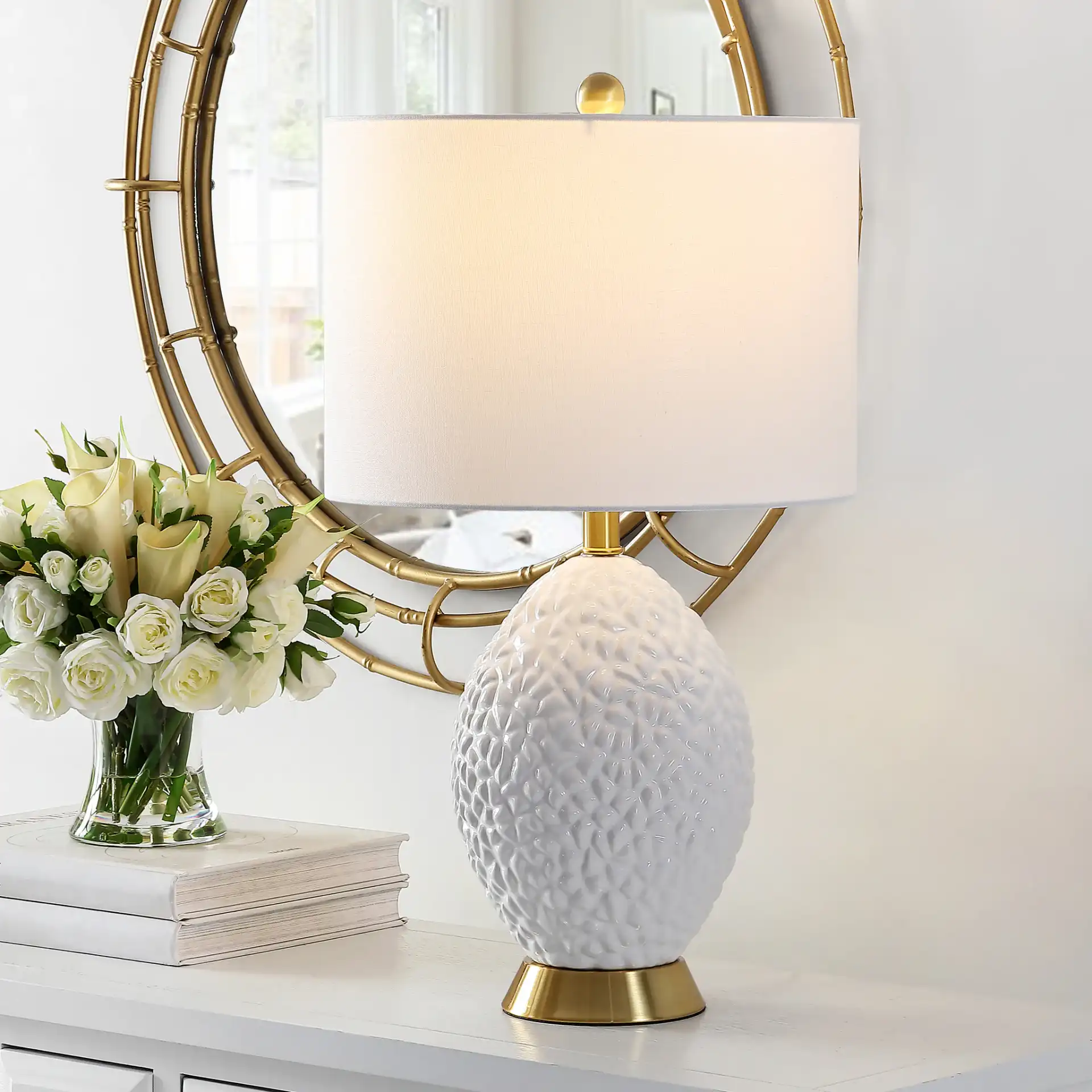 Kimli Table Lamp in White / Brass in a styled room