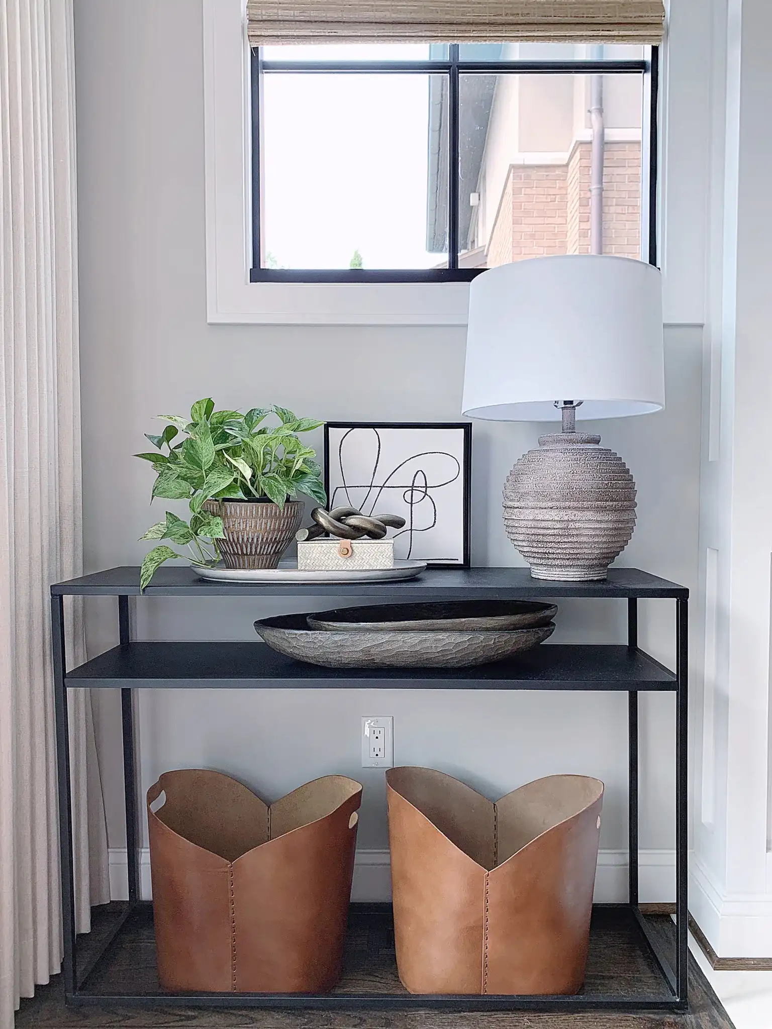 Pendri Table Lamp in Brown in a styled room