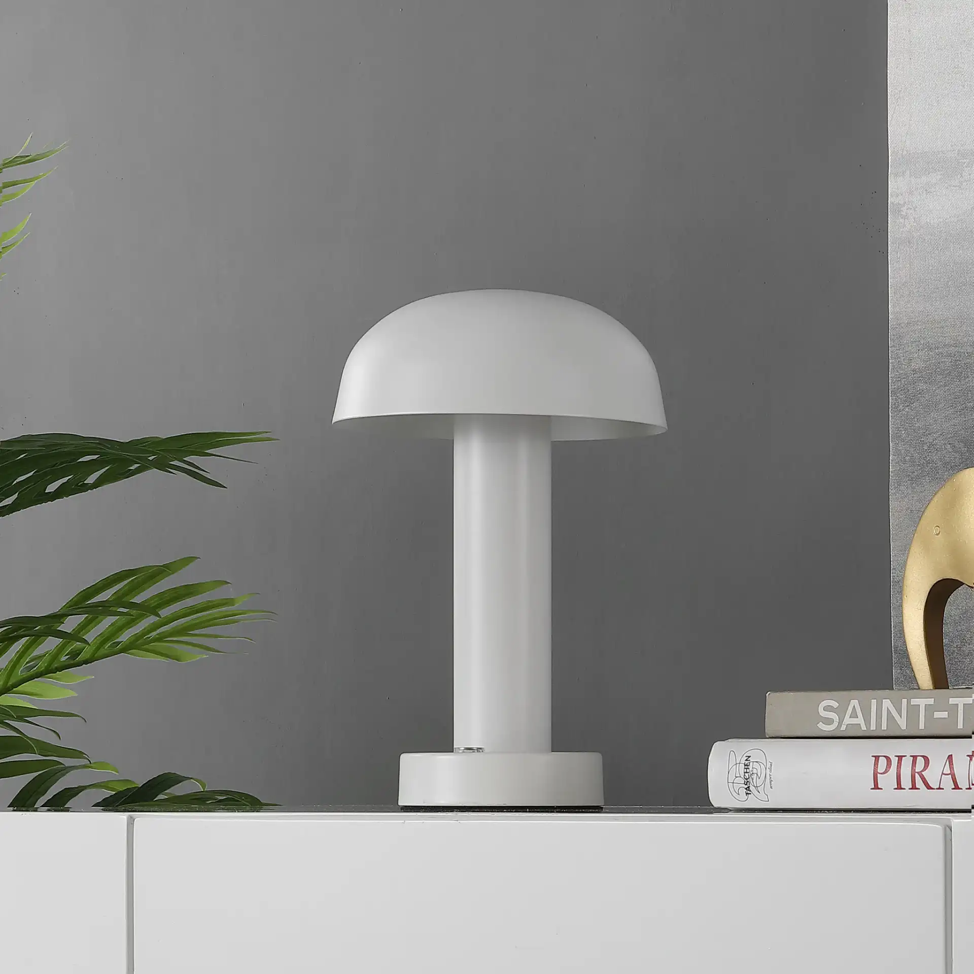 Brahma Rechargeable Led Table Lamp in White in a styled room