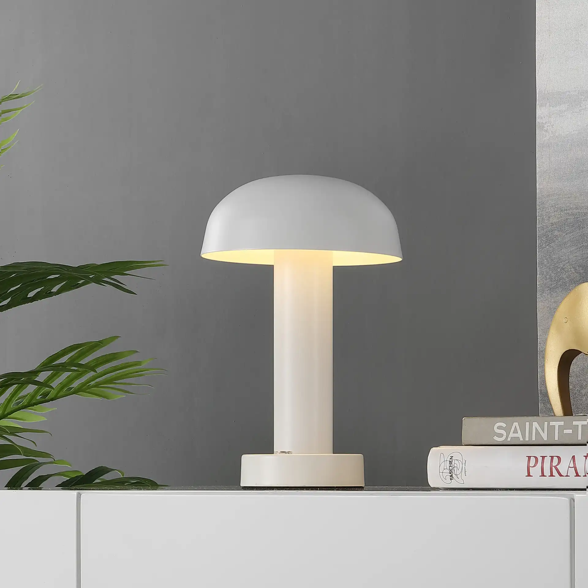 Brahma Rechargeable Led Table Lamp in White in a styled room