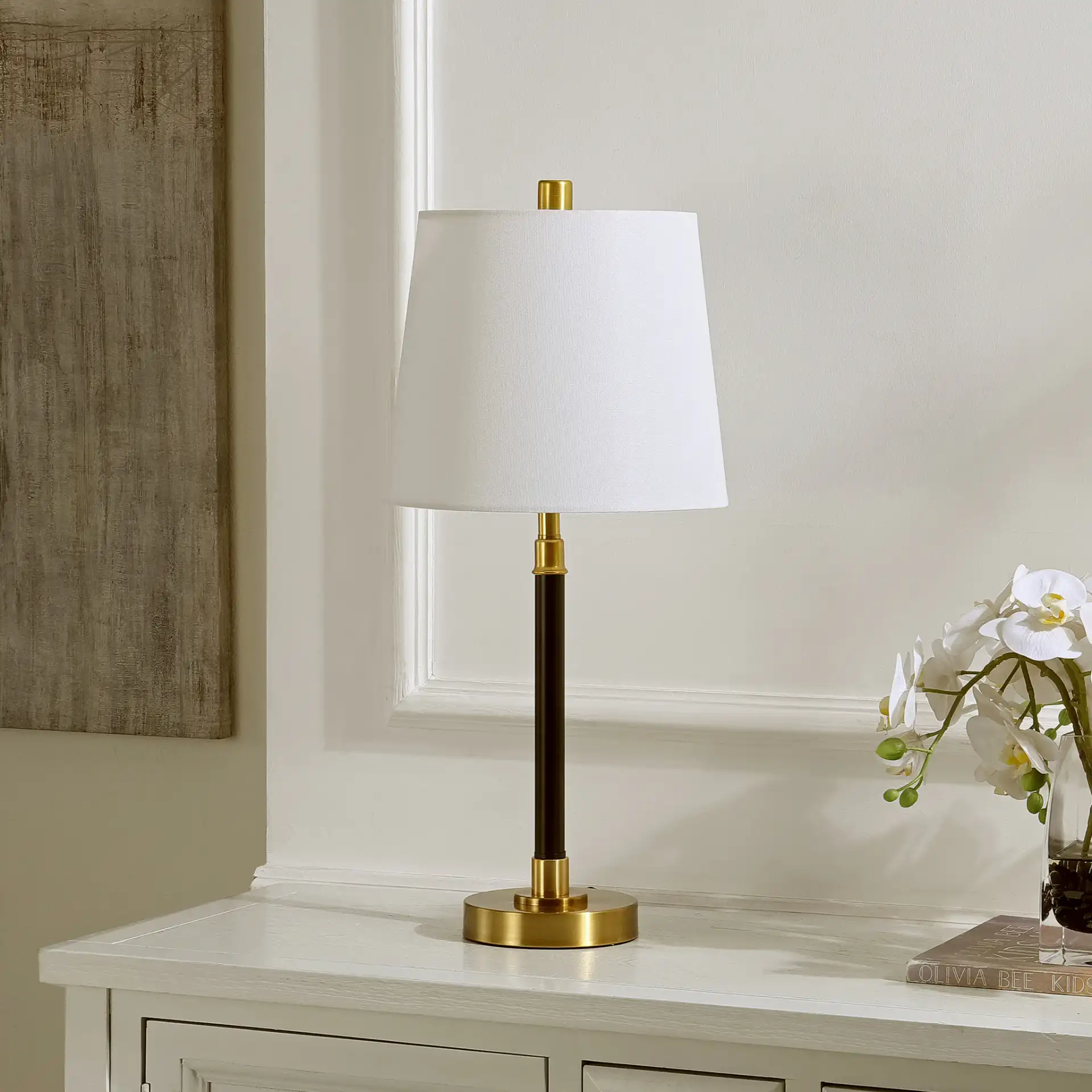 Vitale Table Lamp in Black / Brass in a styled room