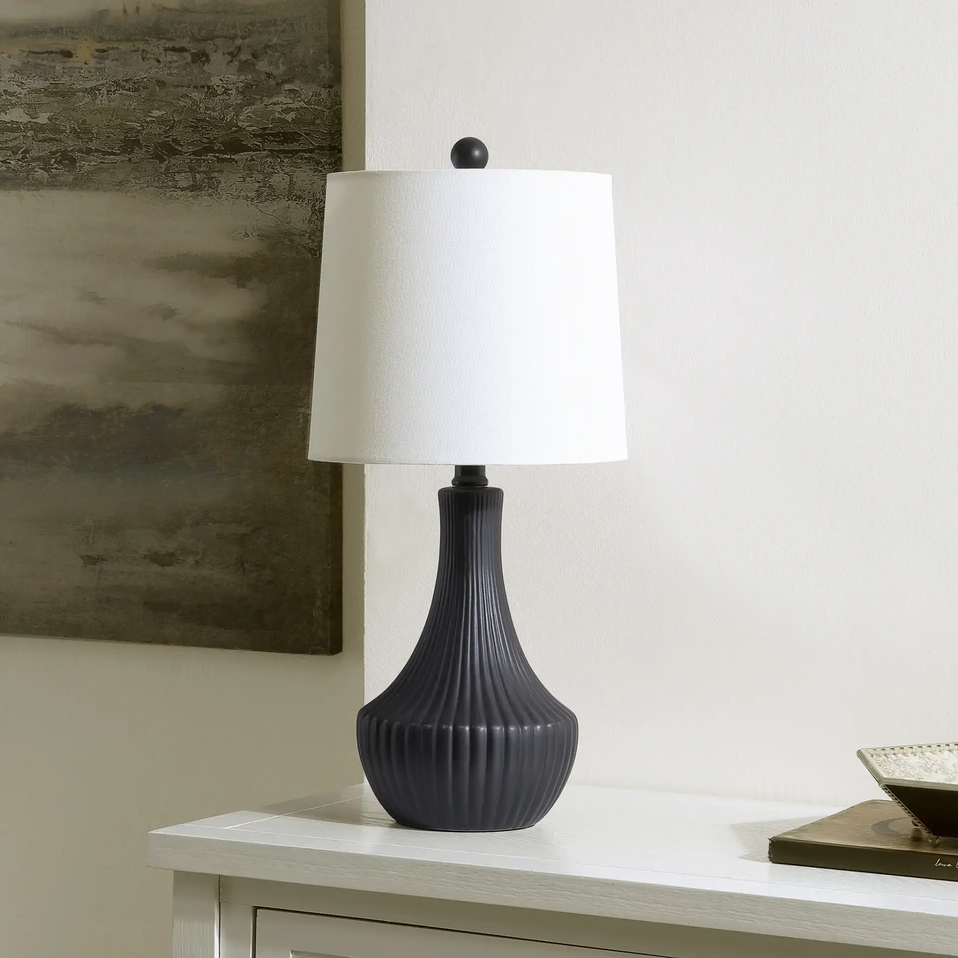 Herleva Table Lamp in Black in a styled room