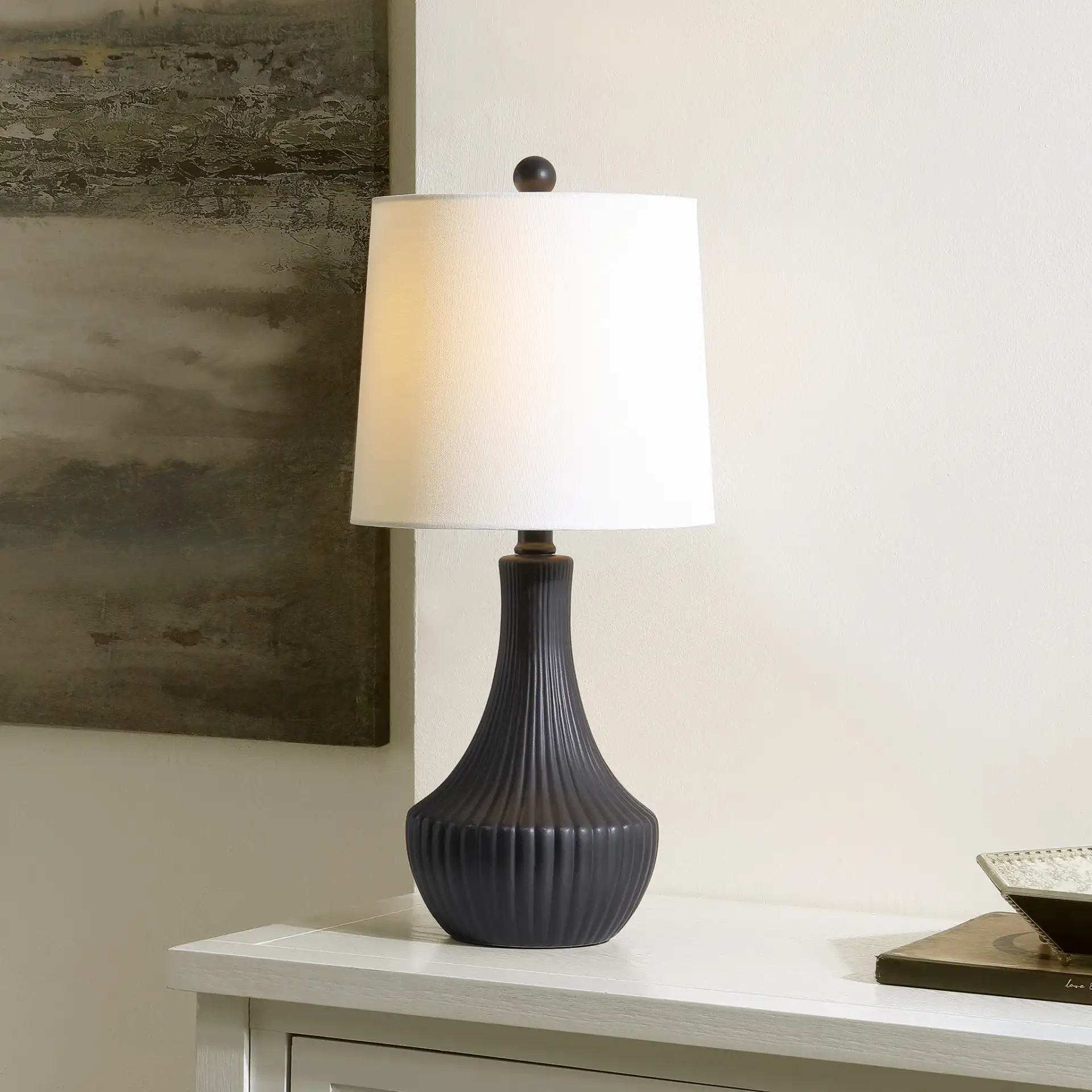Herleva Table Lamp in Black in a styled room