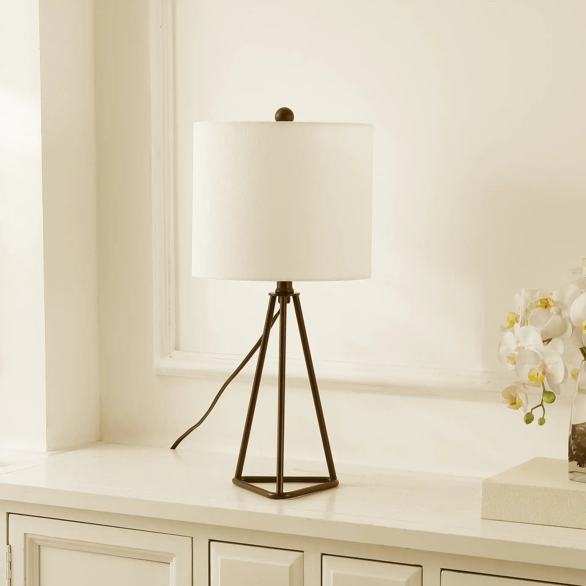 Vernelle Table Lamp in Black in a styled room