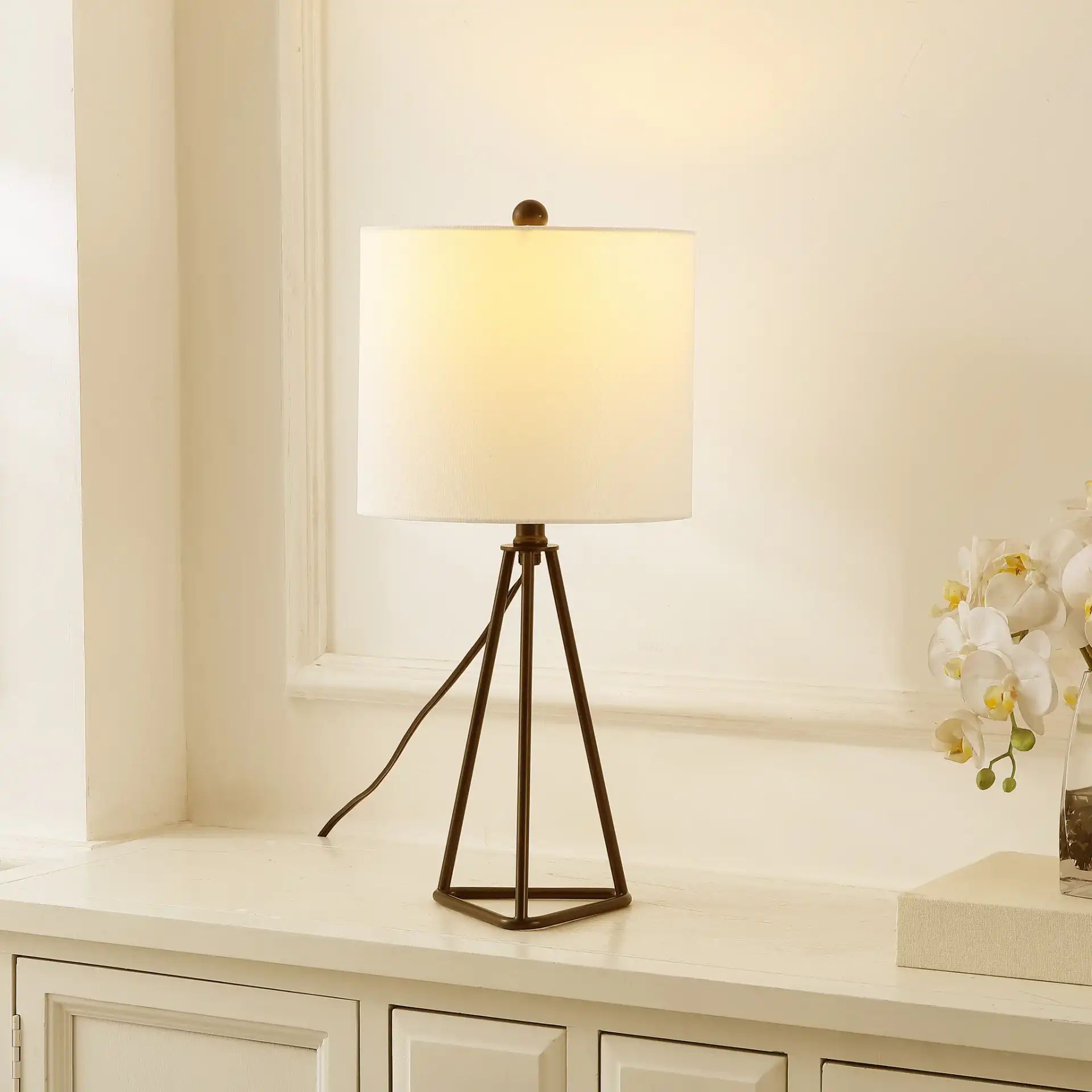 Vernelle Table Lamp in Black in a styled room