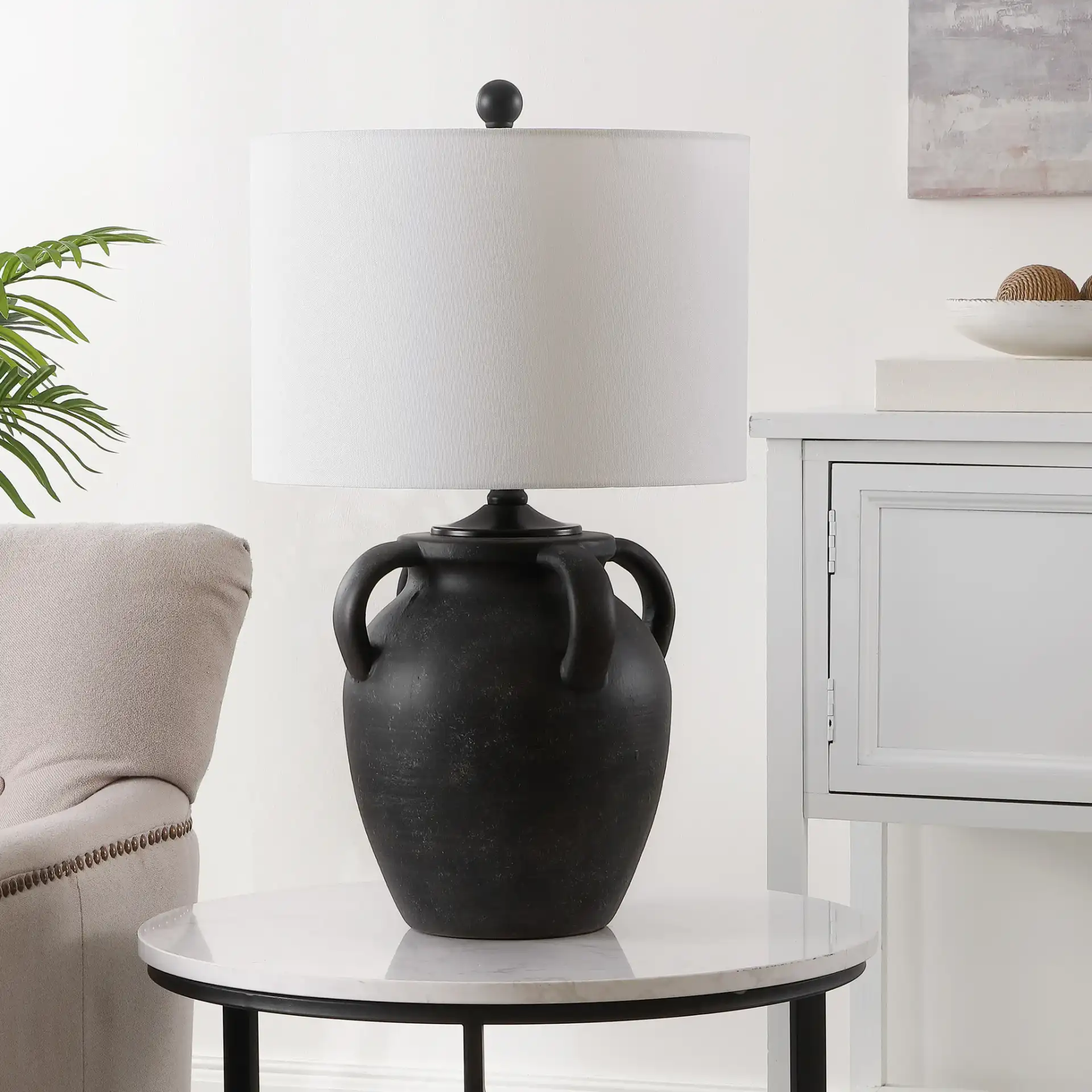 Rhynne Table Lamp in Black in a styled room