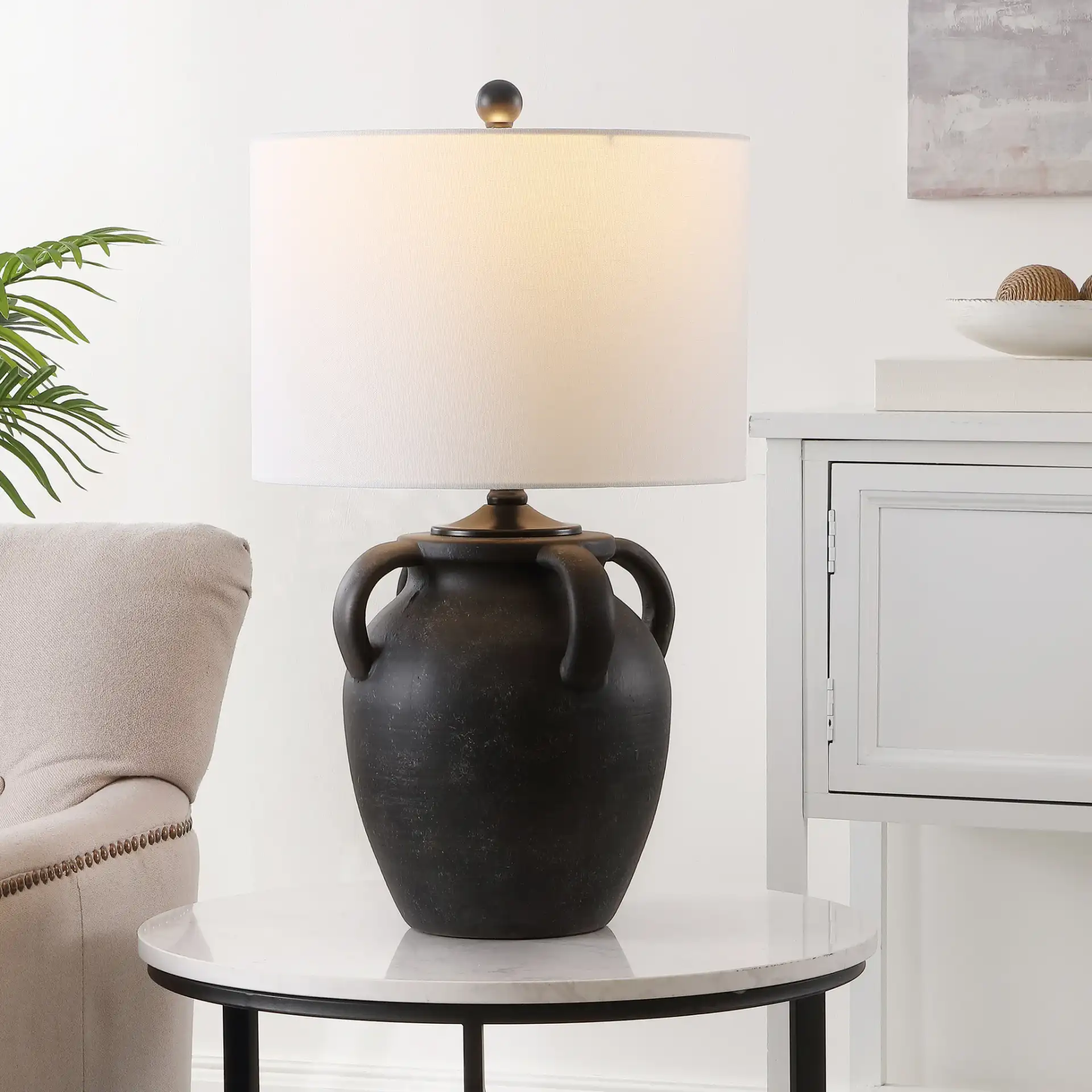 Rhynne Table Lamp in Black in a styled room