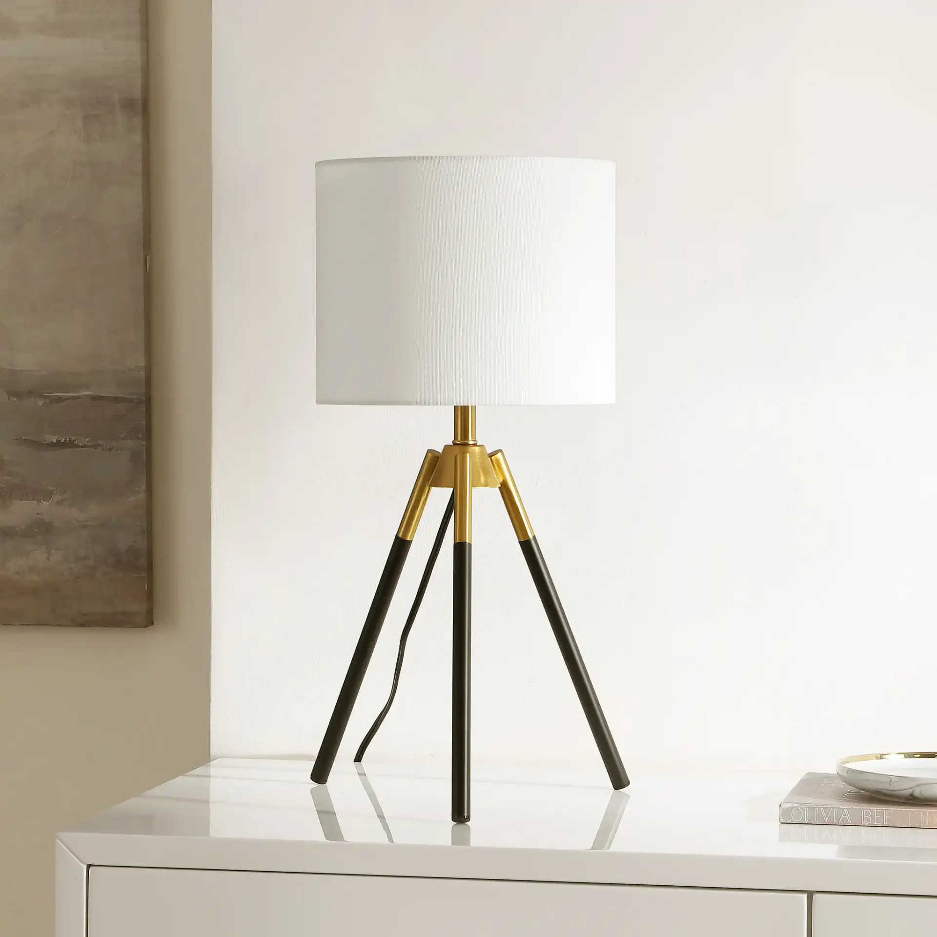 Jupiter Table Lamp in Black / Brass in a styled room