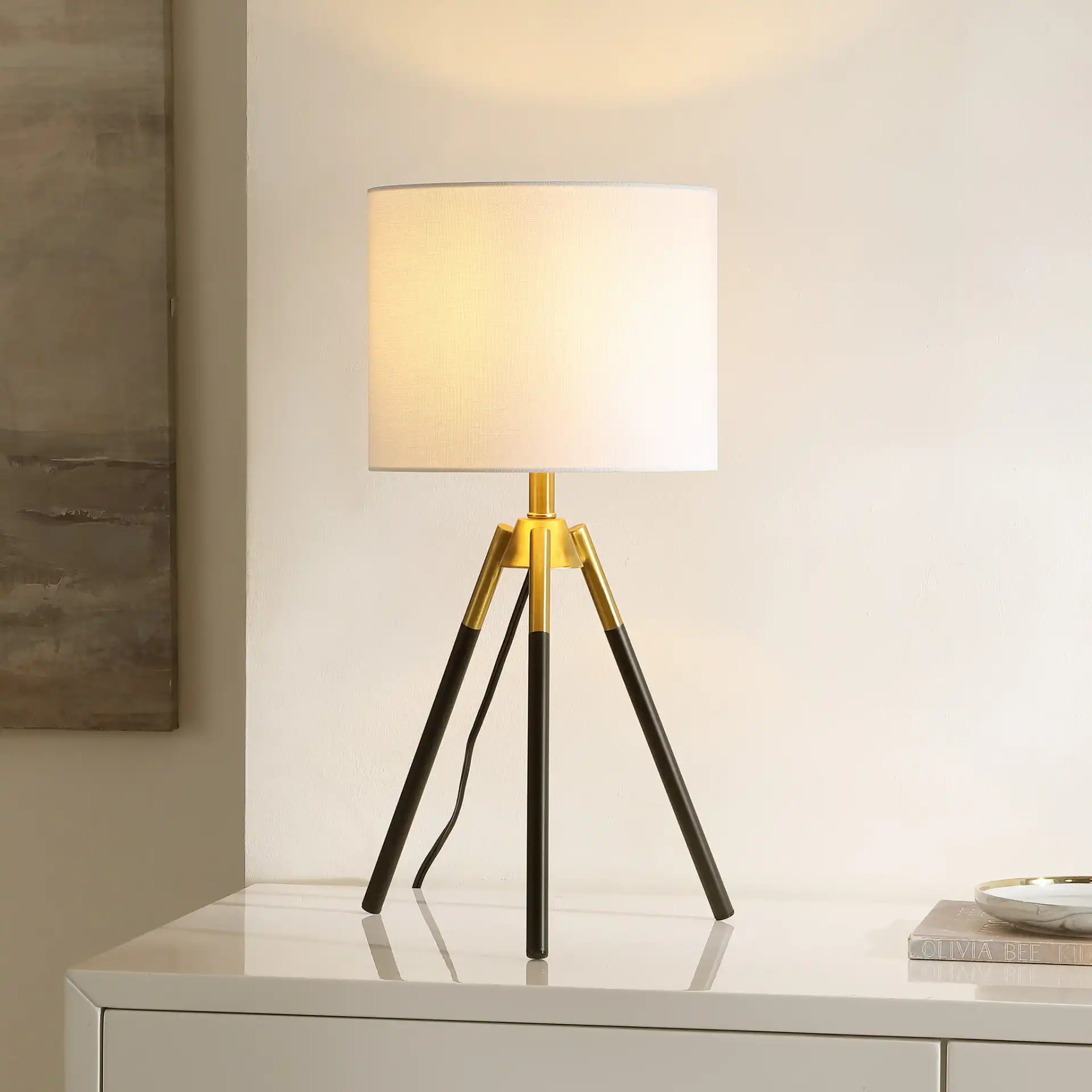 Jupiter Table Lamp in Black / Brass in a styled room