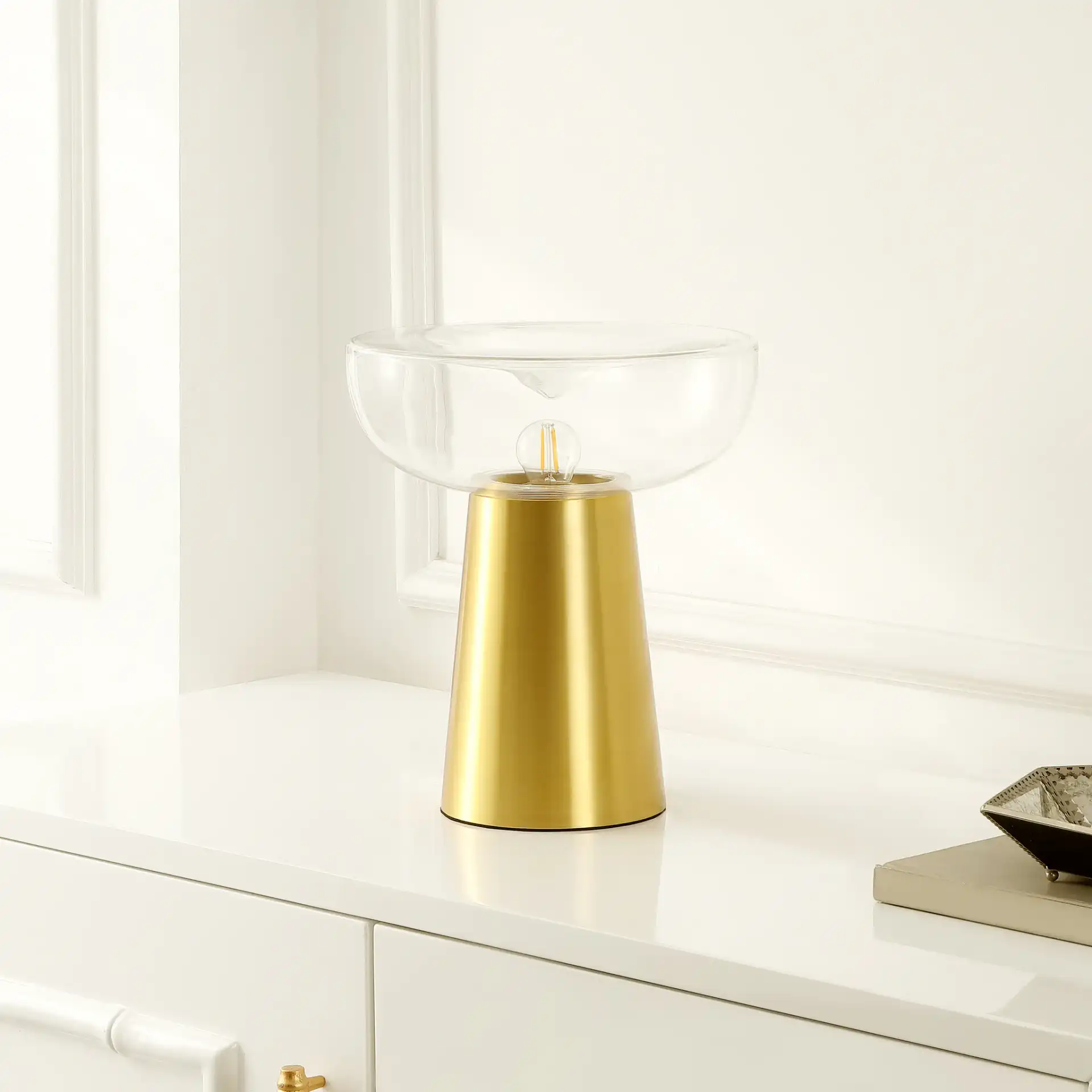 Vassar Table Lamp in Brass / Clear in a styled room