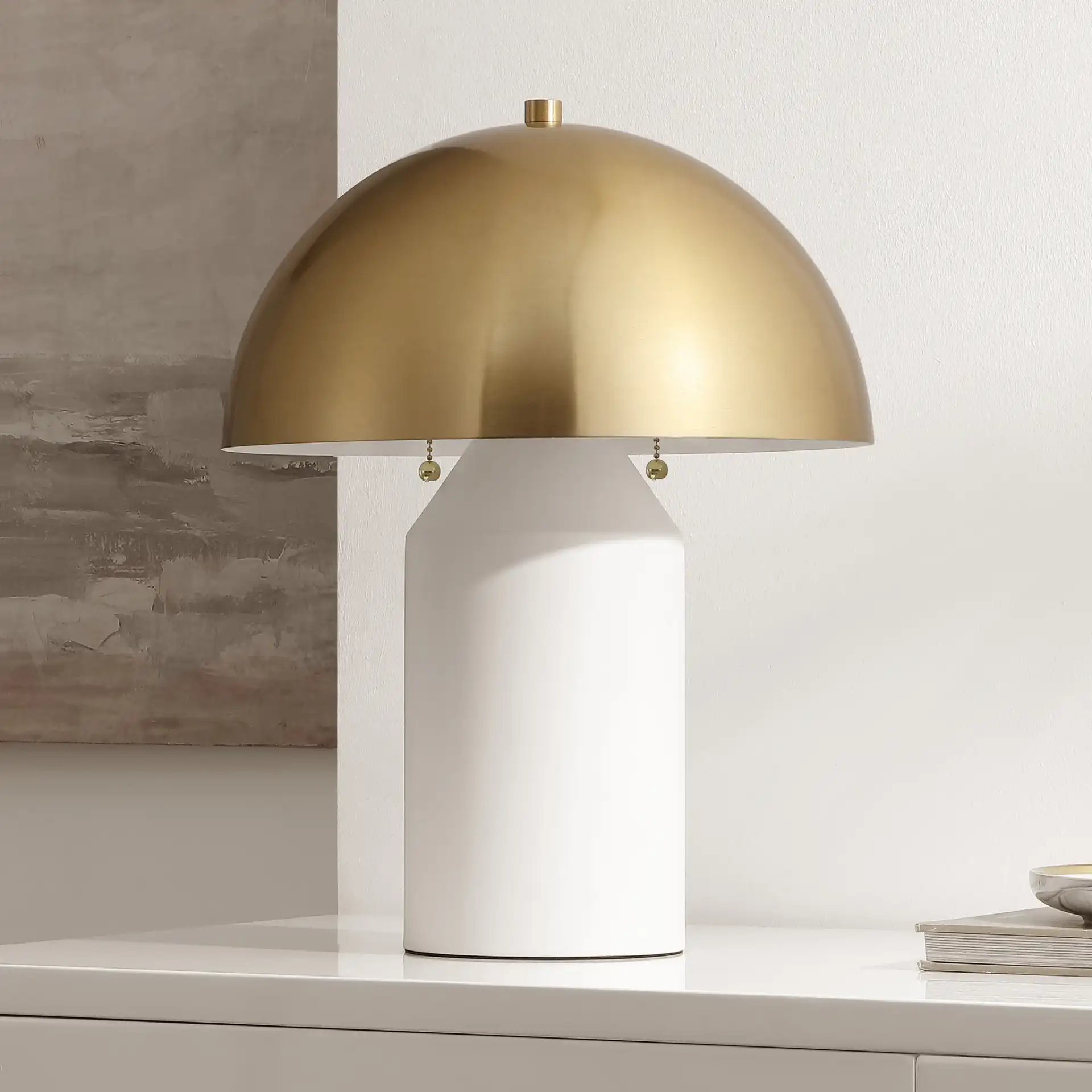 Jove Table Lamp in Brass Gold / White in a styled room