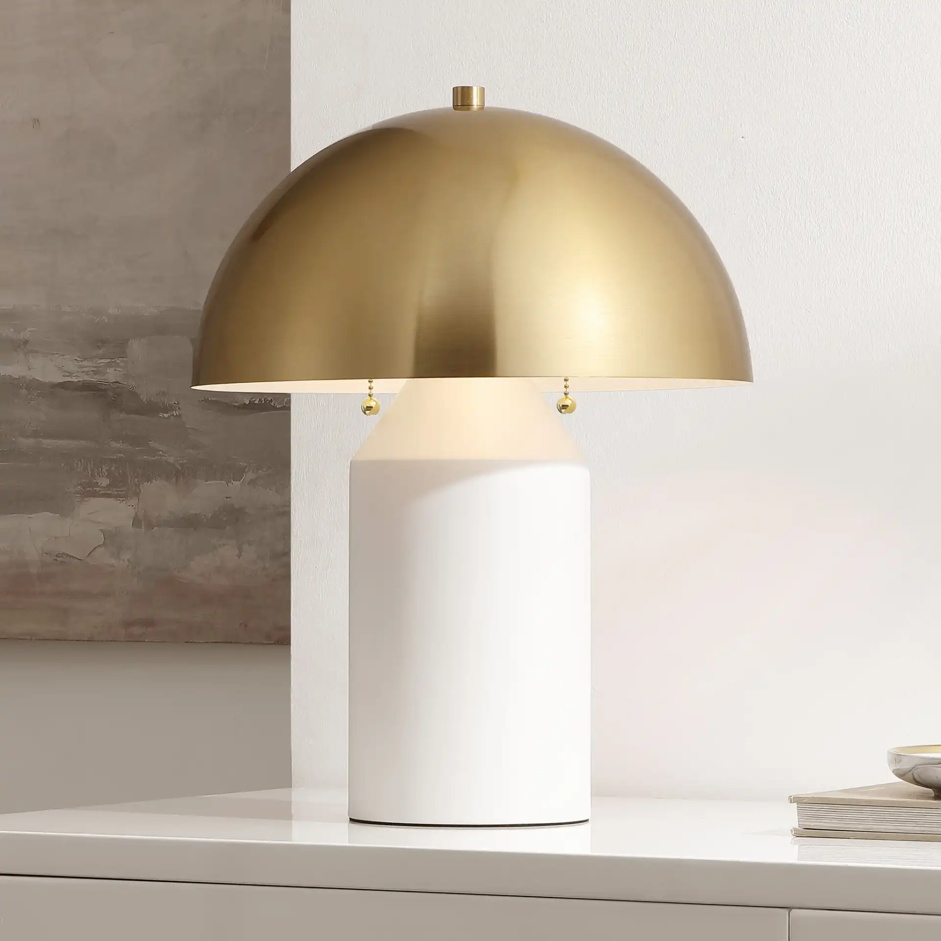 Jove Table Lamp in Brass Gold / White in a styled room