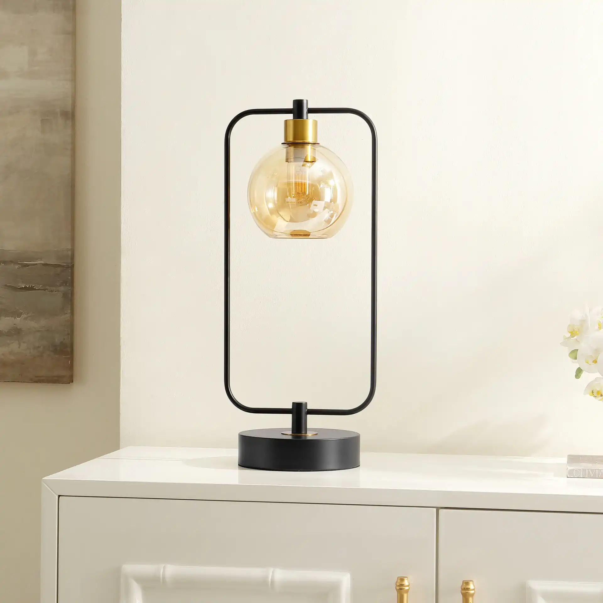 Jayson Table Lamp in Black / Amber in a styled room