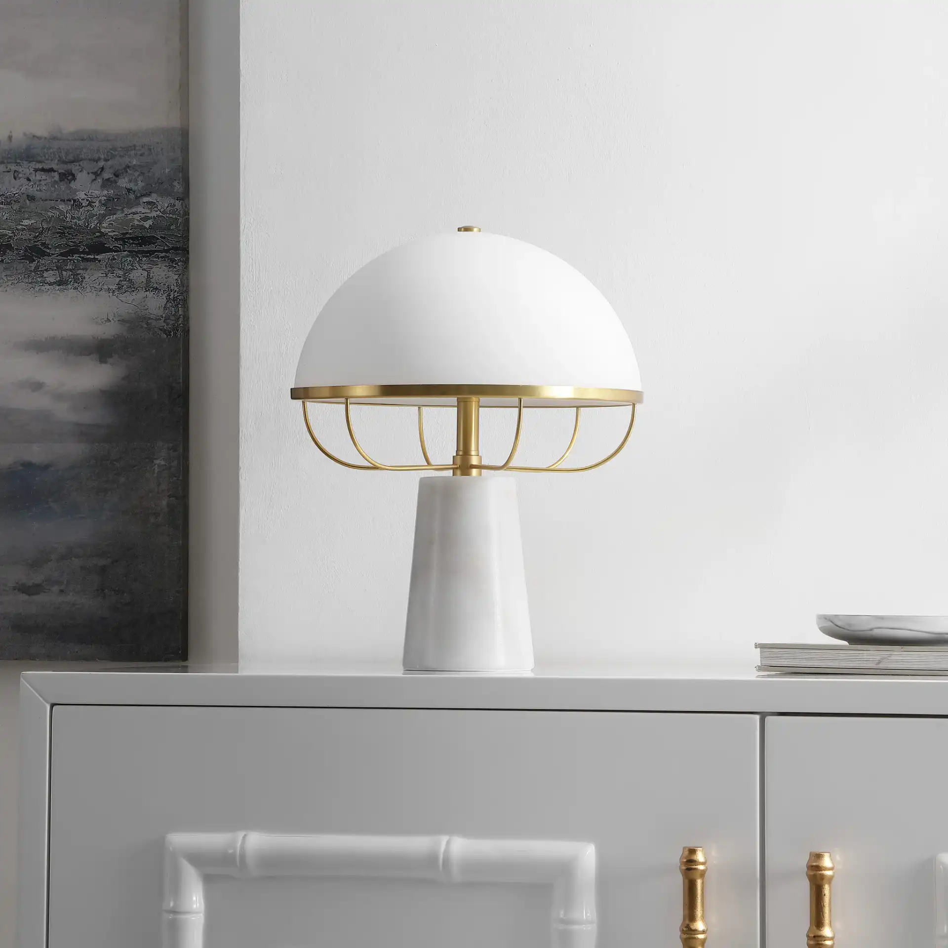 Fraser Table Lamp in White / Brass in a styled room