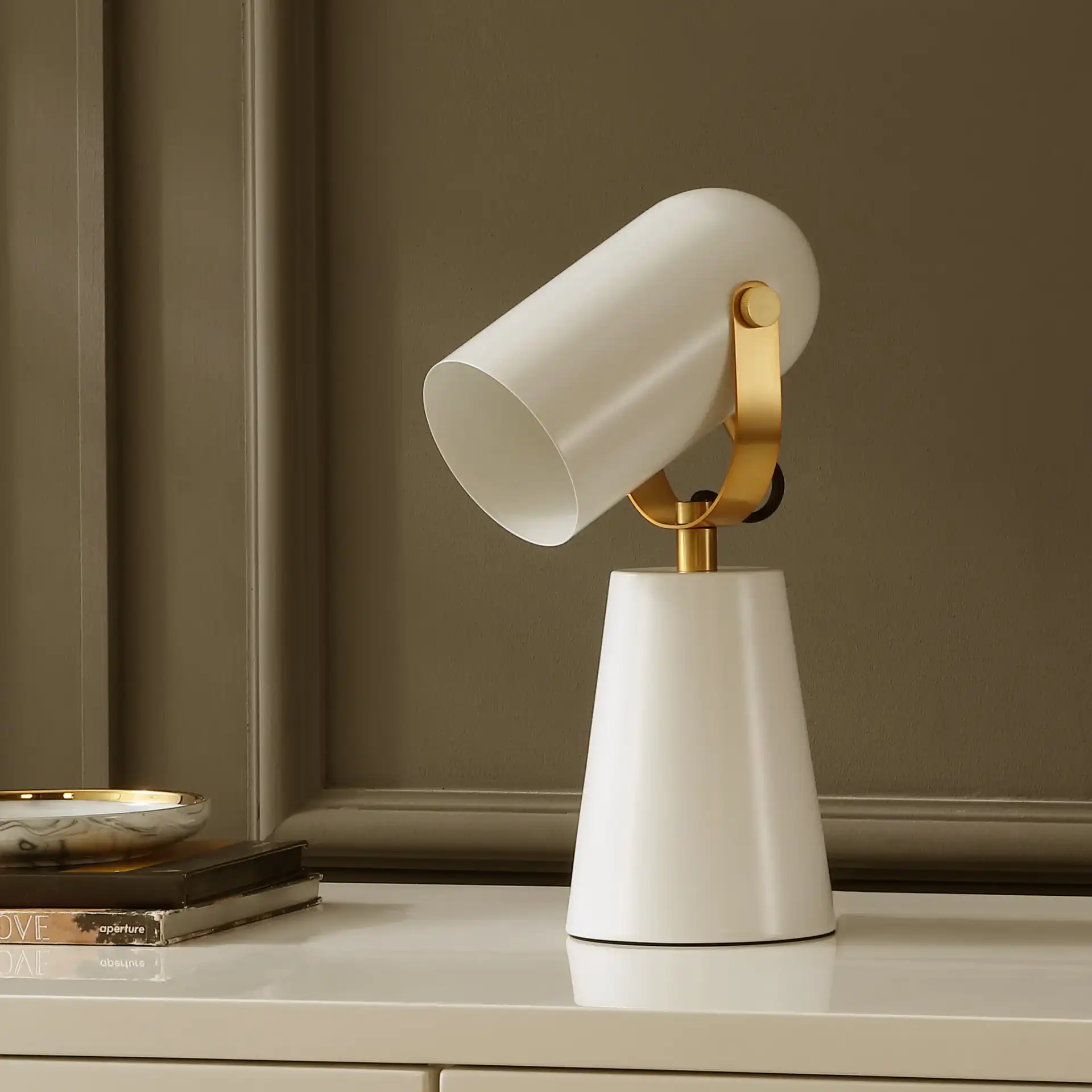 Clarst Table Lamp in White / Brass in a styled room