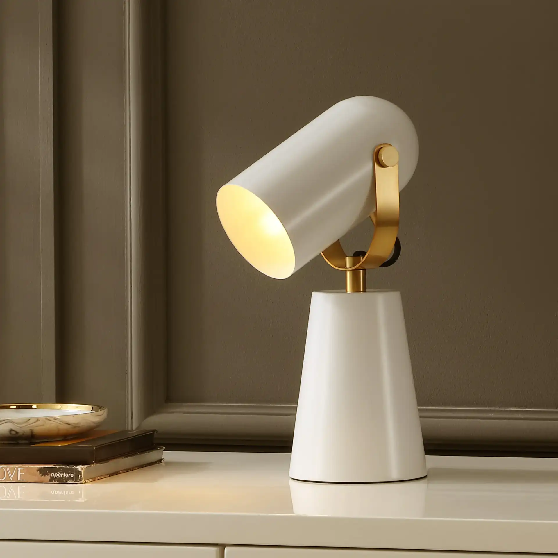 Clarst Table Lamp in White / Brass in a styled room