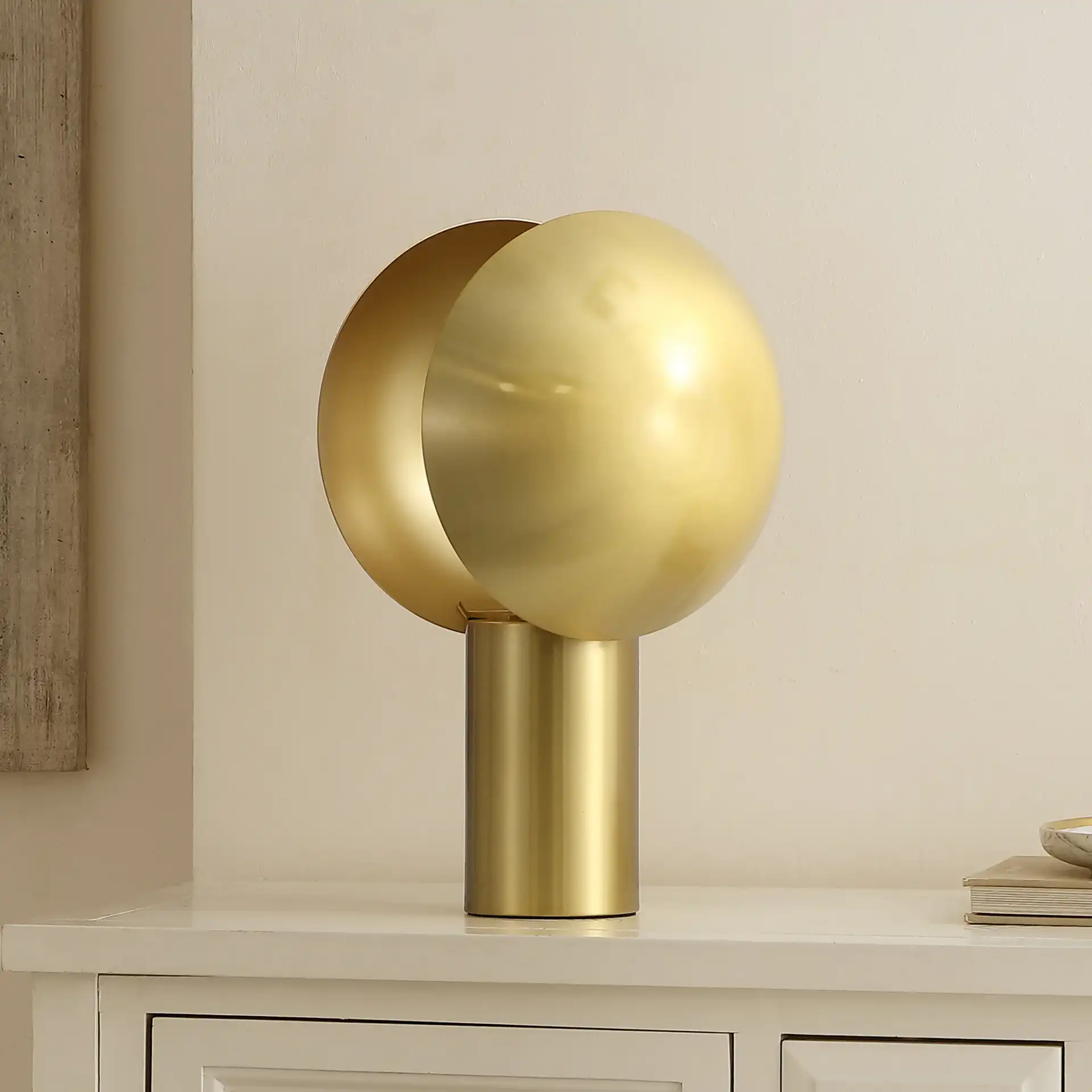 Frey Table Lamp in Brass in a styled room
