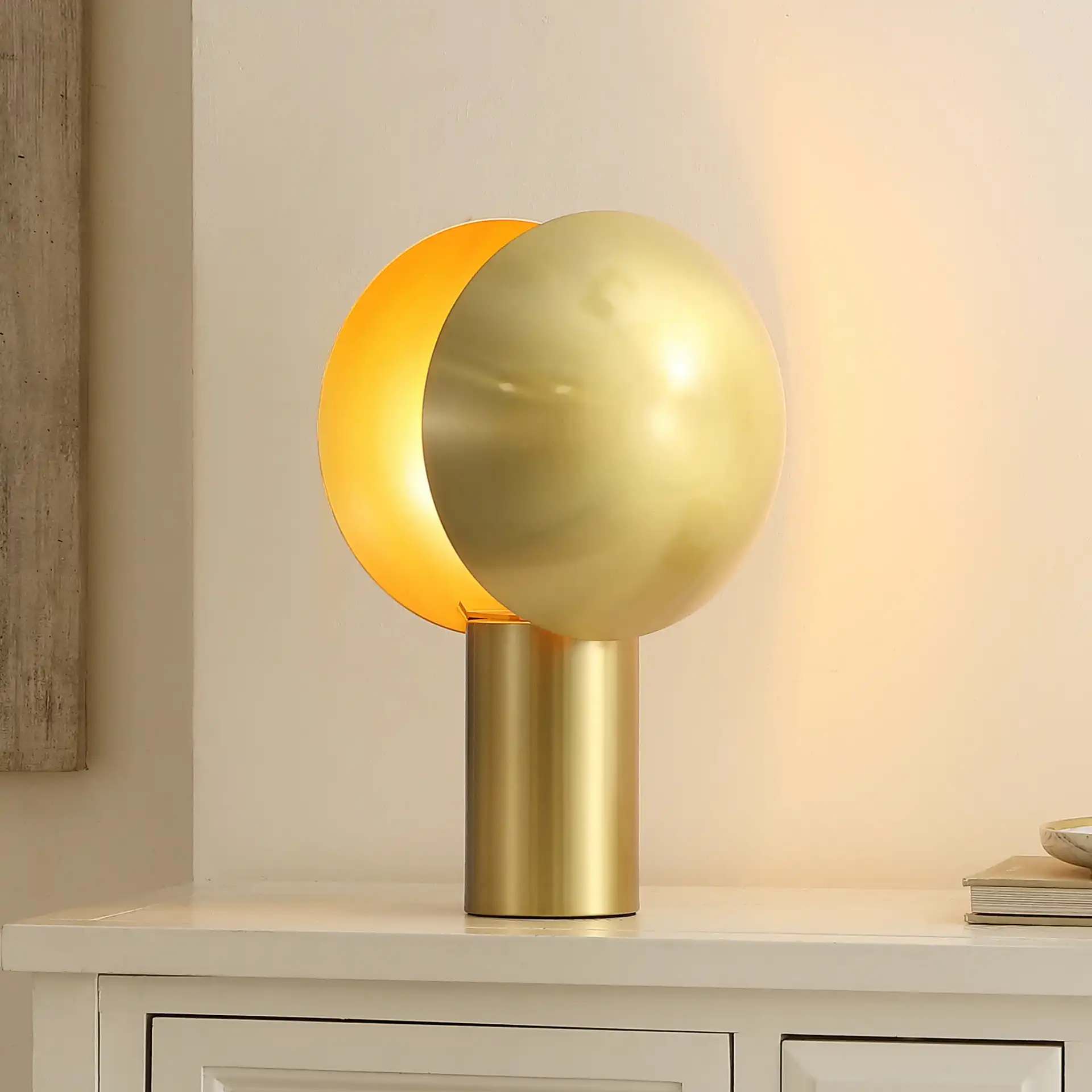 Frey Table Lamp in Brass in a styled room