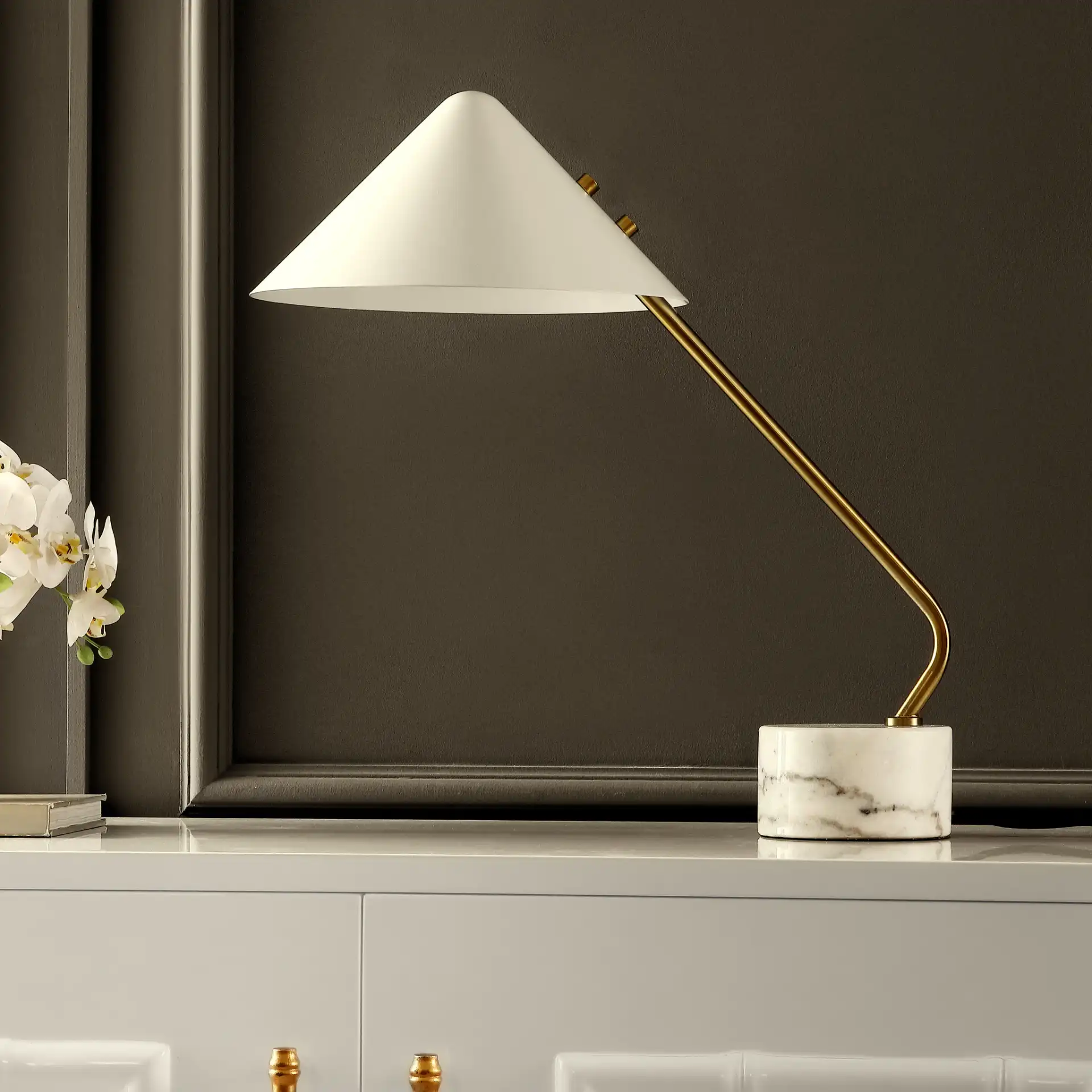 Shields Table Lamp in White / Brass in a styled room