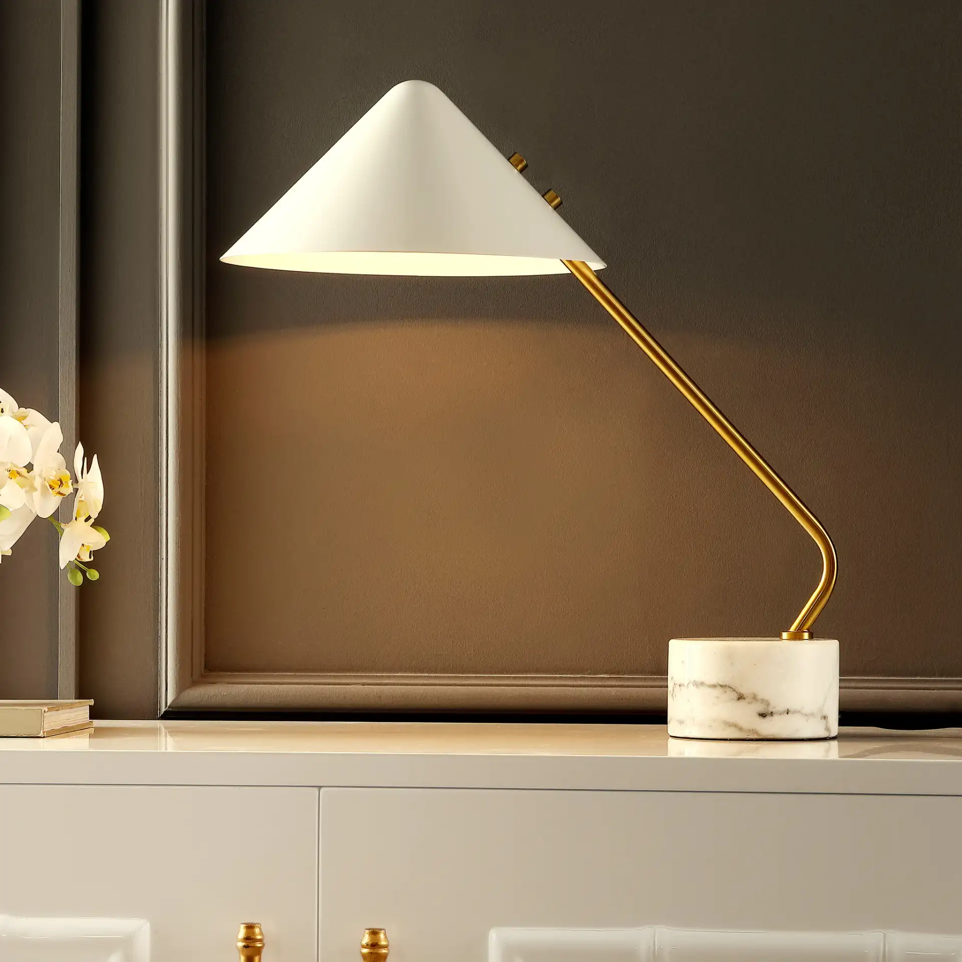 Shields Table Lamp in White / Brass in a styled room