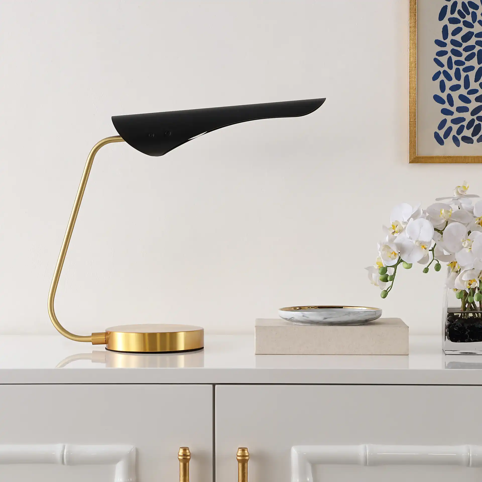 Fynn Table Lamp in Black / Brass in a styled room