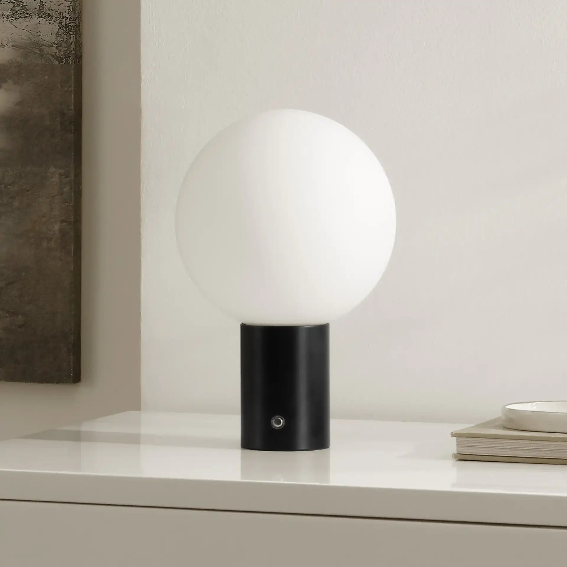 Moxy Table Lamp in Black in a styled room