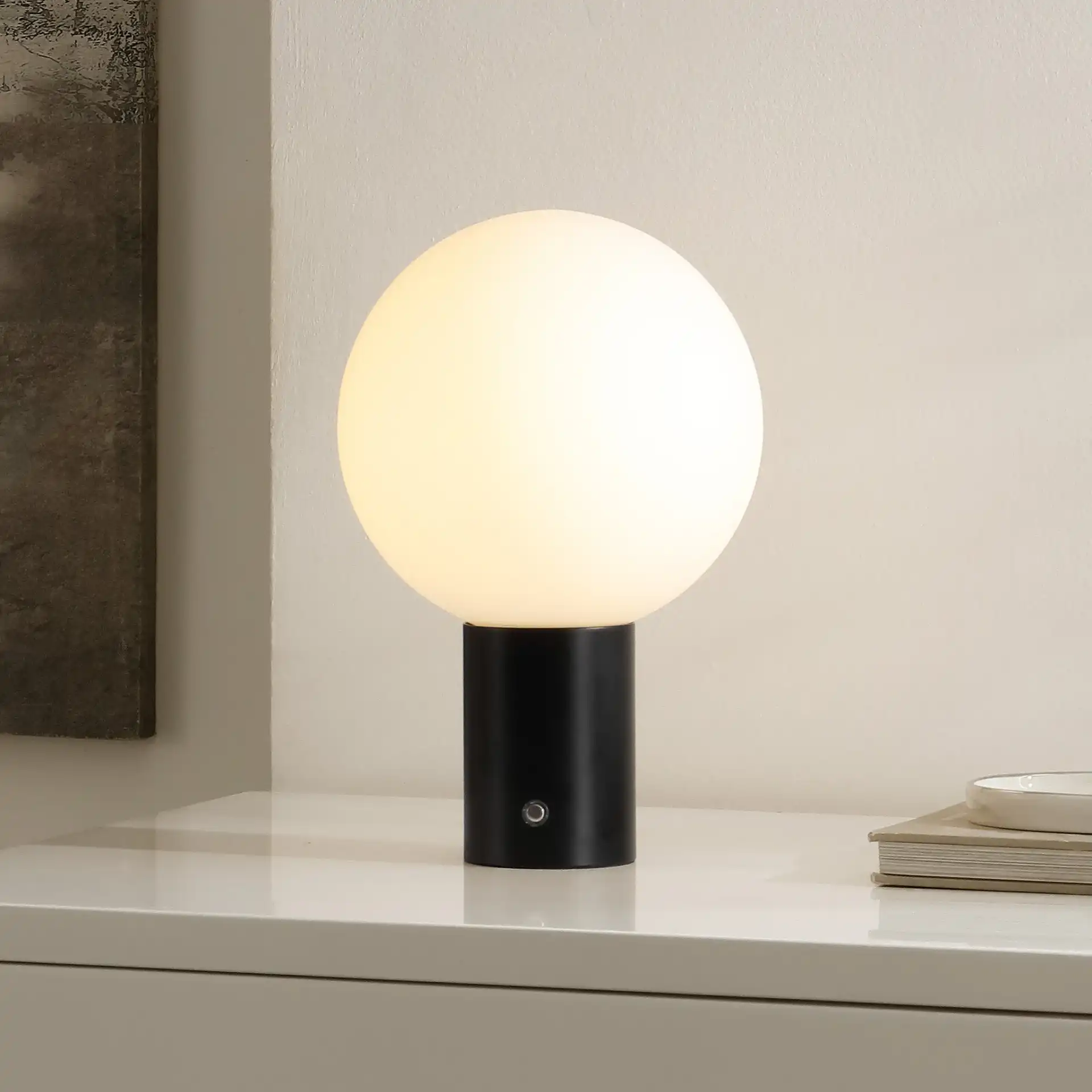 Moxy Table Lamp in Black in a styled room
