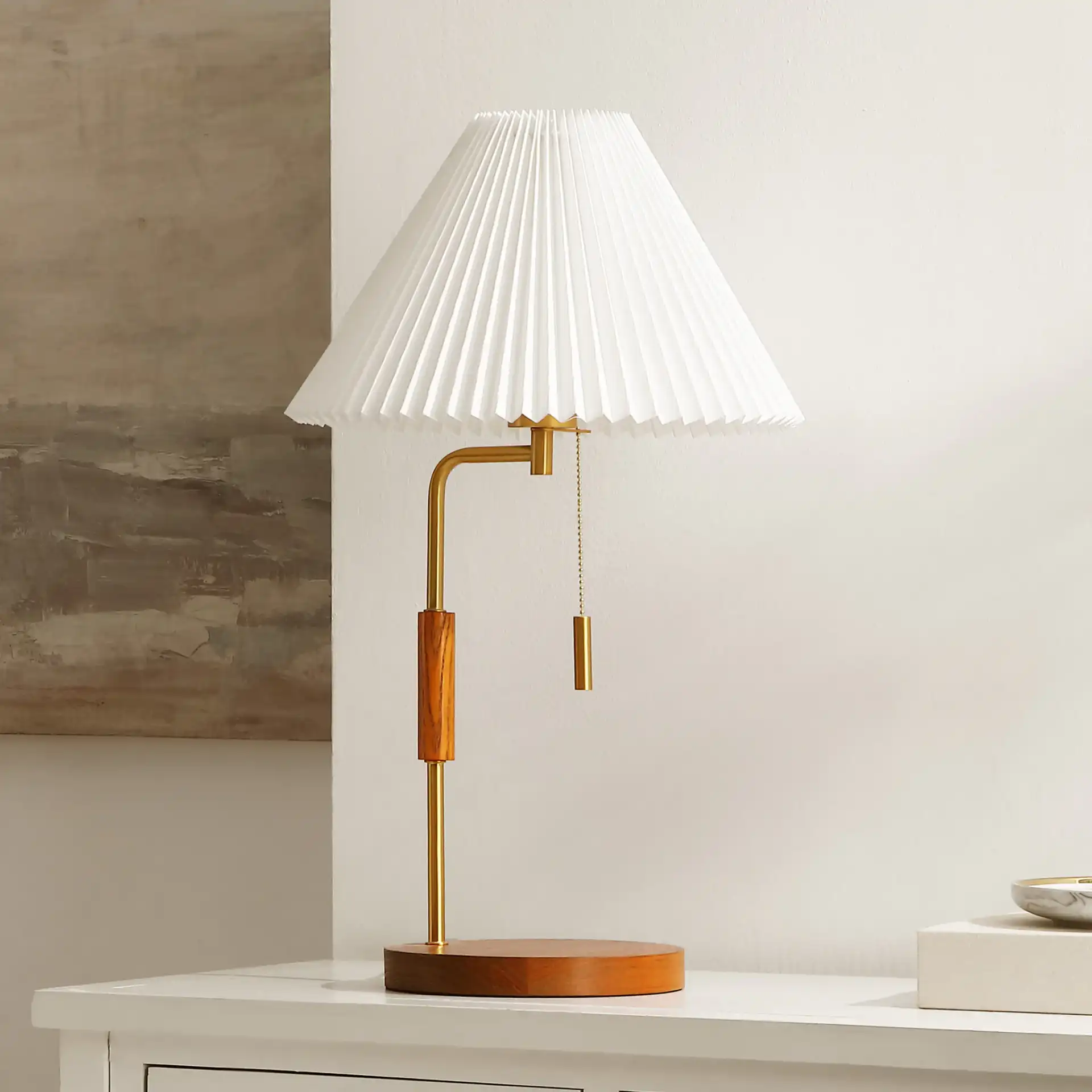 Jonah Table Lamp in Walnut / Brass in a styled room