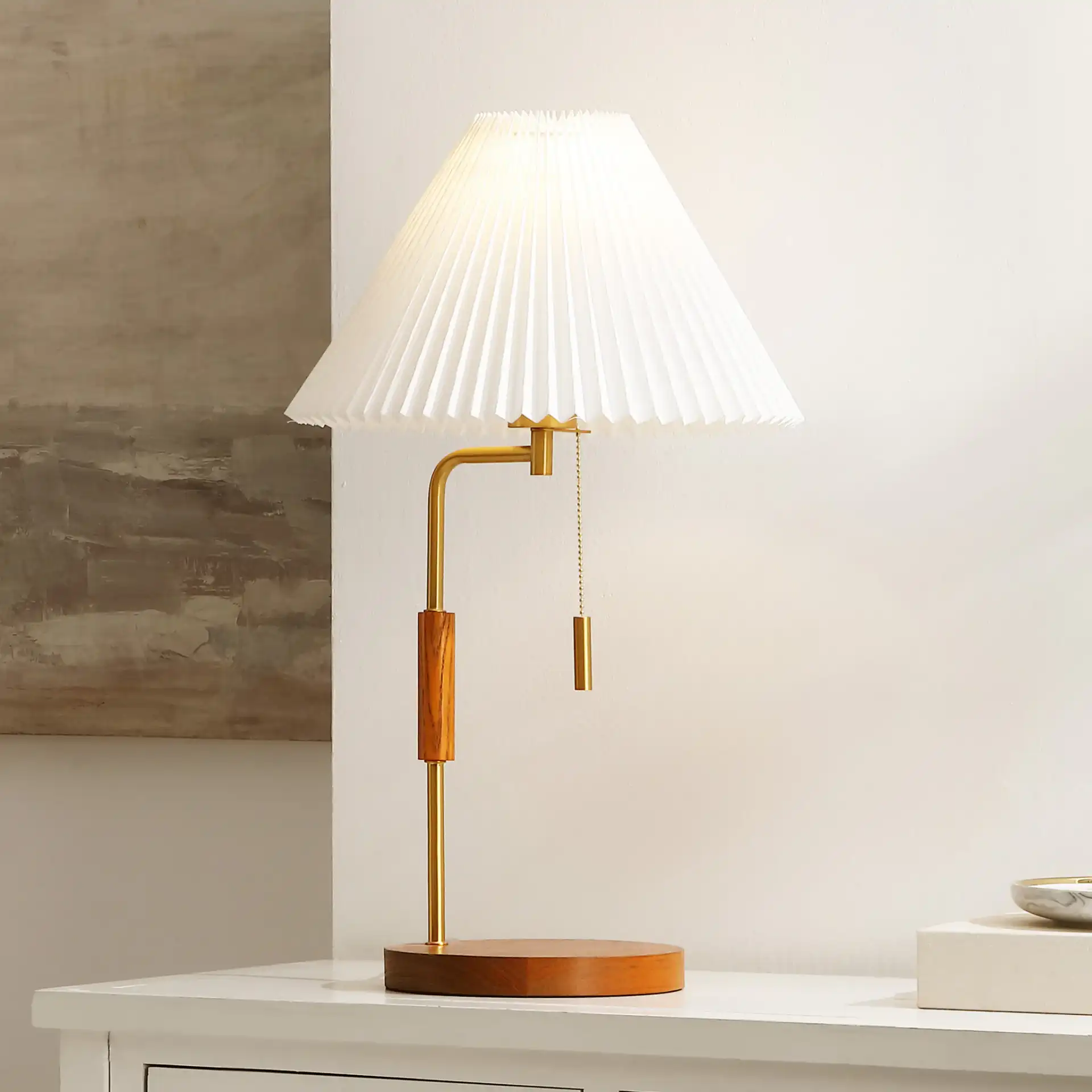 Jonah Table Lamp in Walnut / Brass in a styled room
