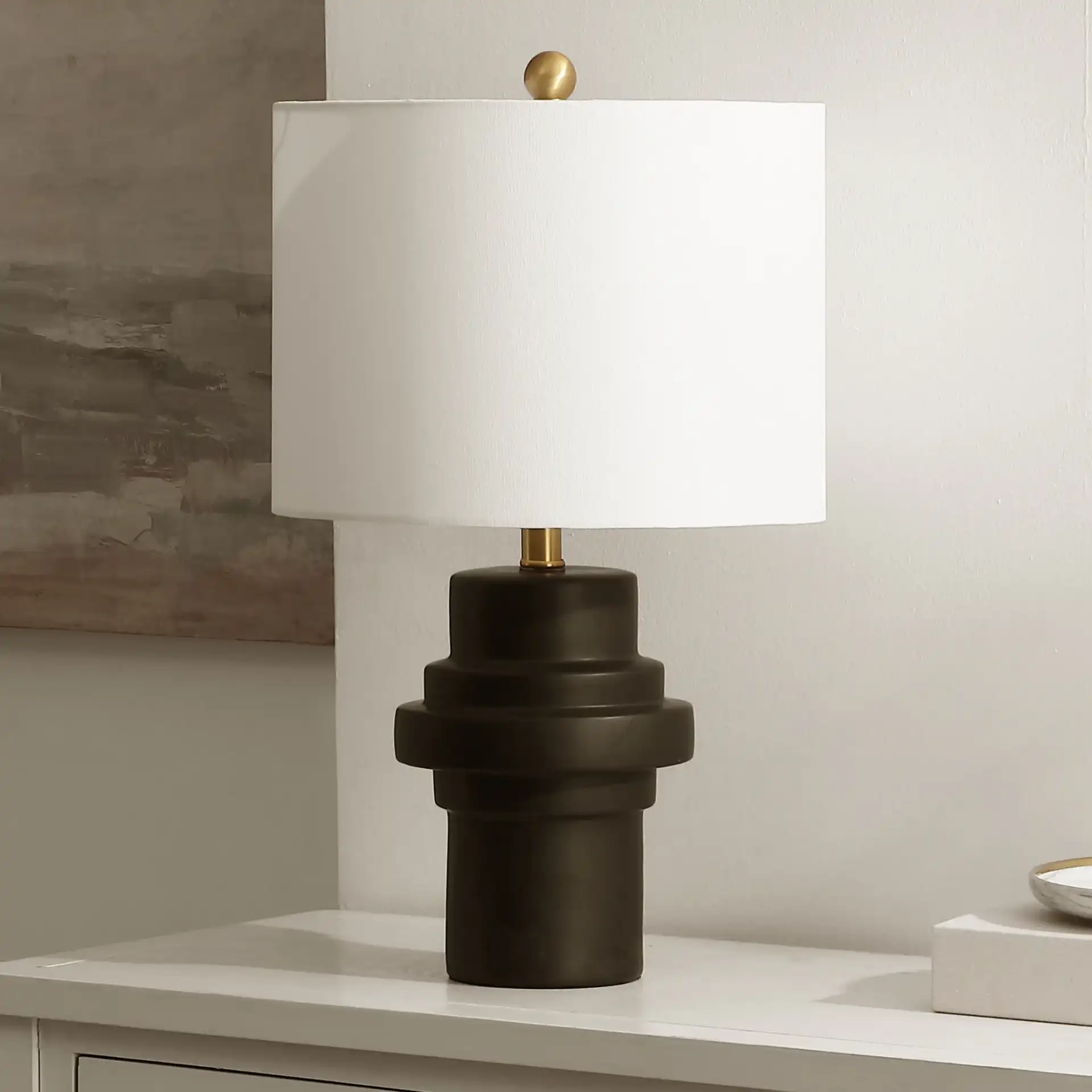 Doni Table Lamp in Black / Brass Gold in a styled room