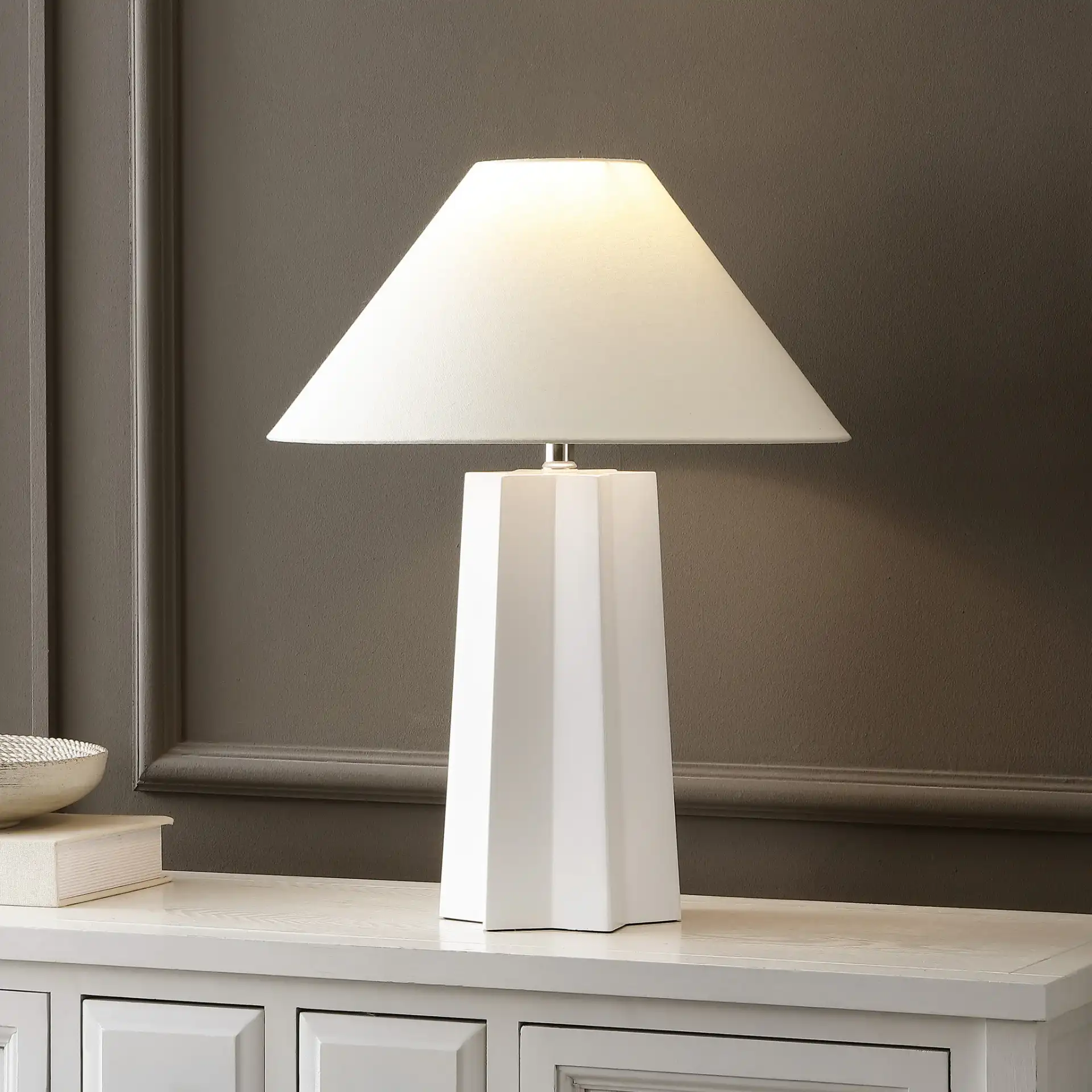 Symone Table Lamp in White in a styled room