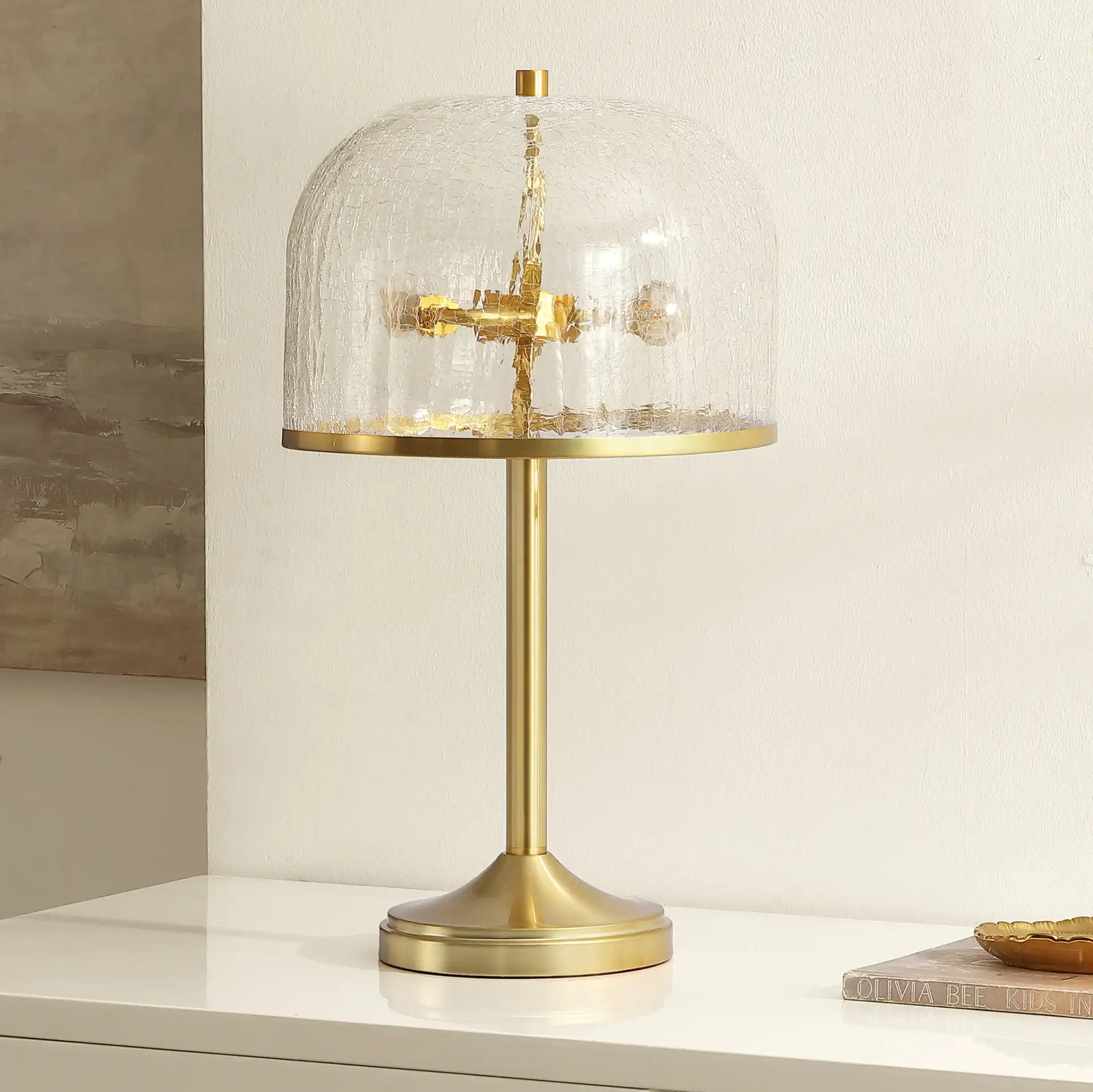 Daye Table Lamp in Clear / Brass in a styled room