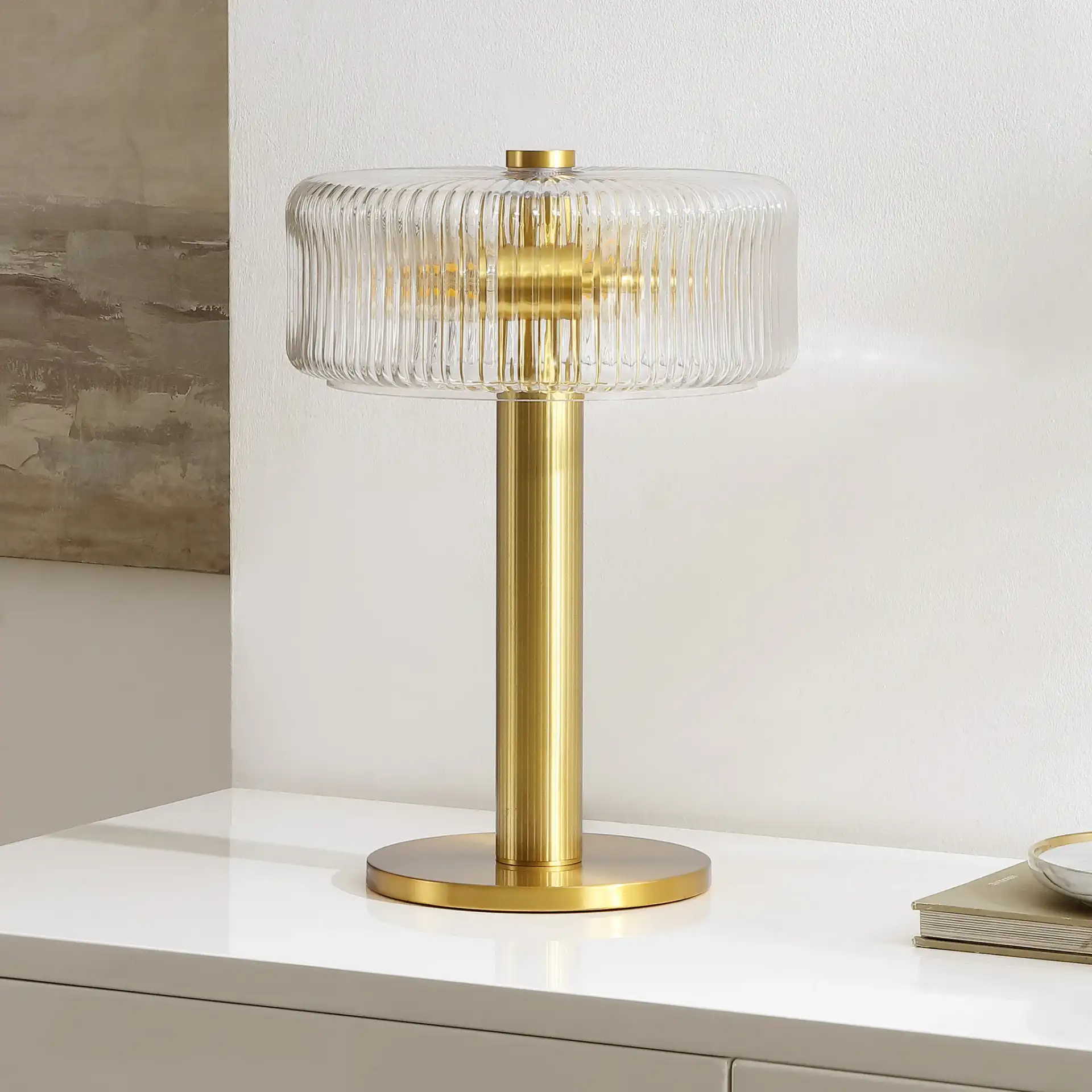 Dua Table Lamp in Clear / Brass in a styled room
