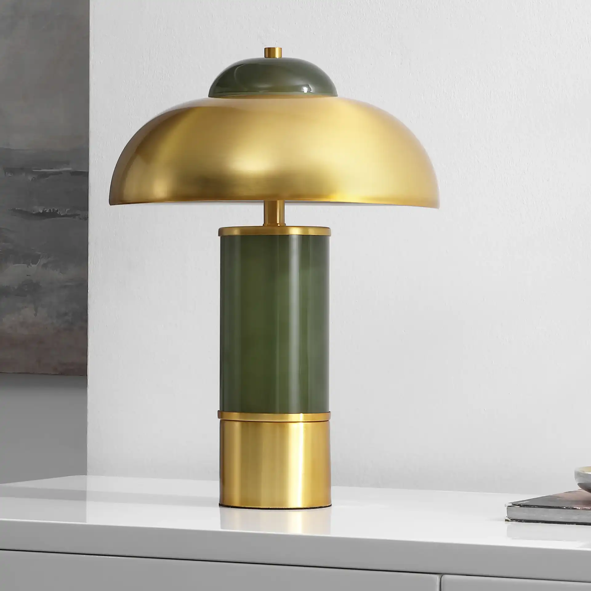 Drea Table Lamp in Green / Brass in a styled room
