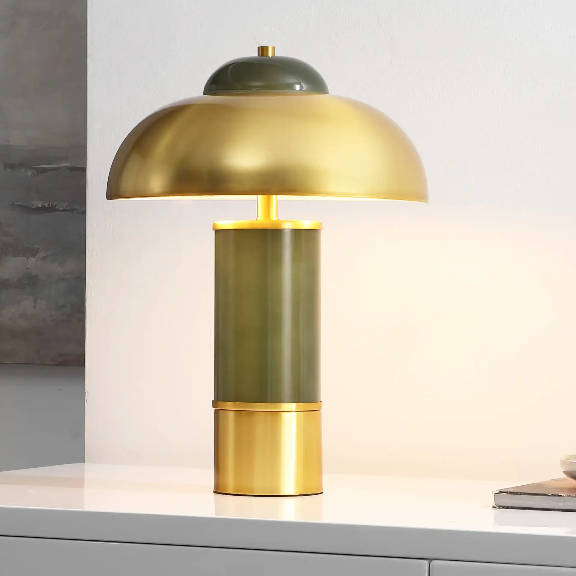 Drea Table Lamp in Green / Brass in a styled room