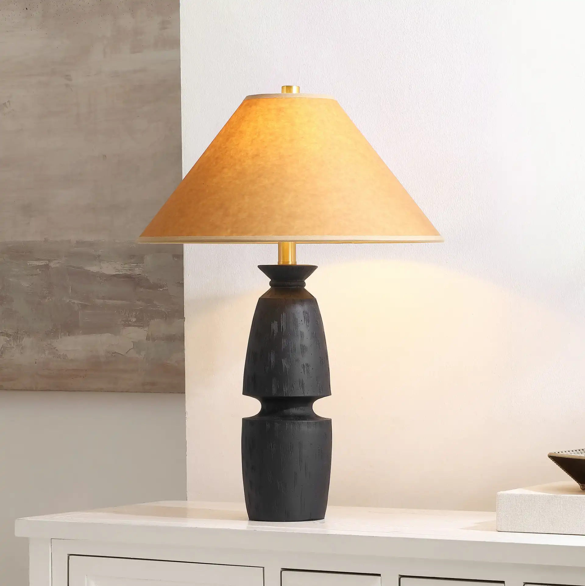 Sola Table Lamp in Black / Camel in a styled room
