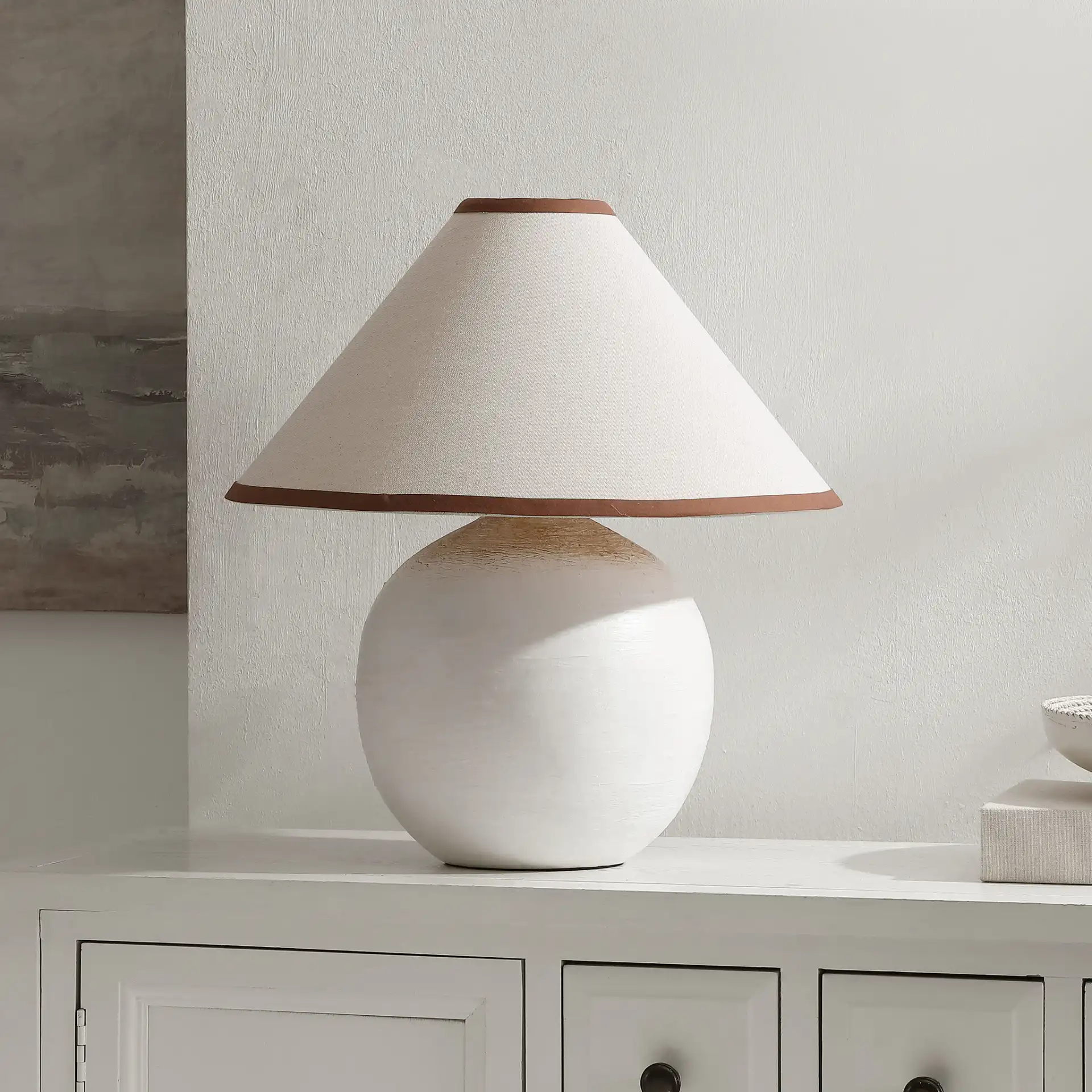 Daneela Table Lamp in White in a styled room