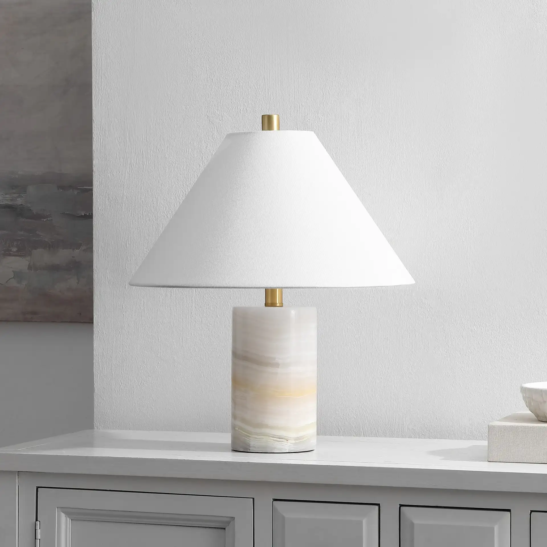 Naelle Table Lamp in White / Gold in a styled room