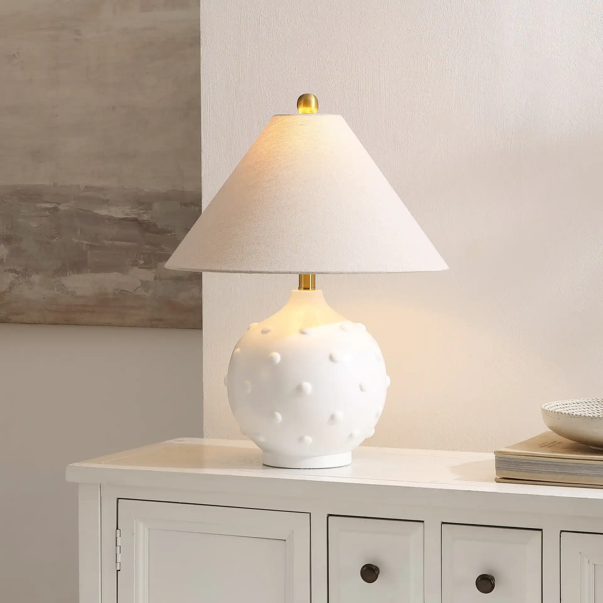 Leanni Table Lamp in White in a styled room