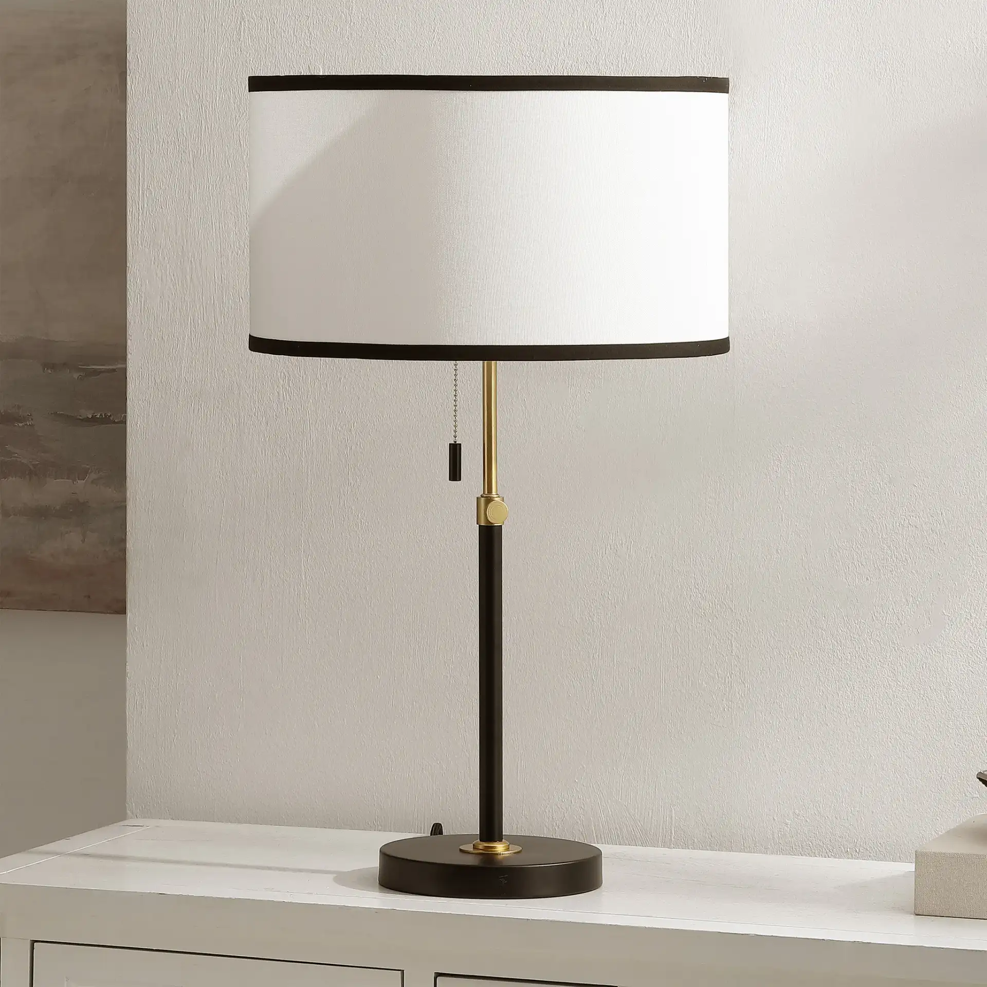 Tegan Table Lamp in Black / Brass in a styled room
