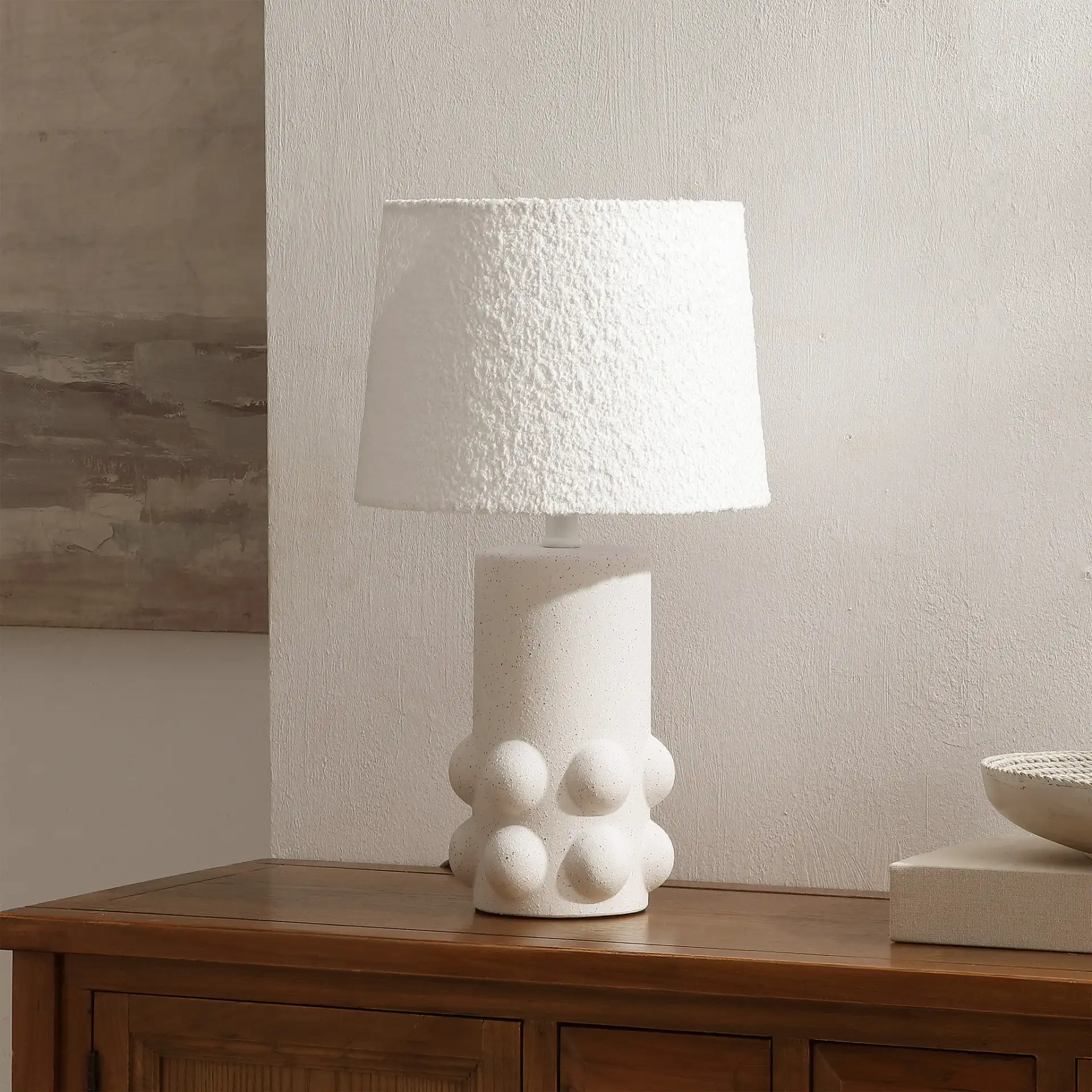 Joss Table Lamp in White in a styled room