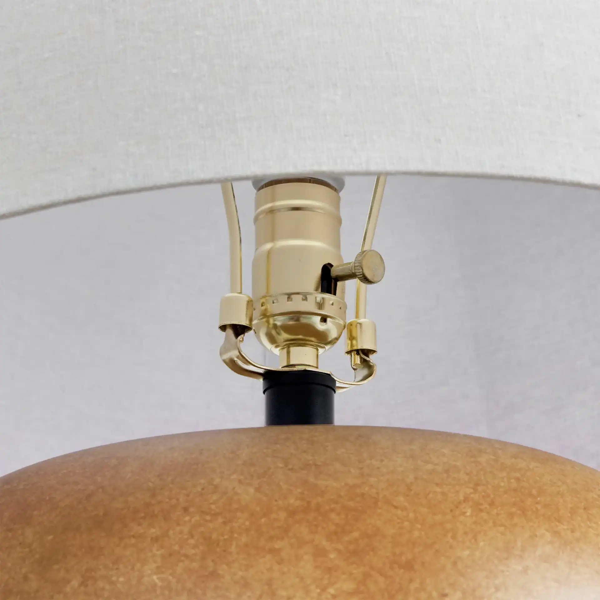 Dannah Ceramic Table Lamp in Brown / Oatmeal in a styled room