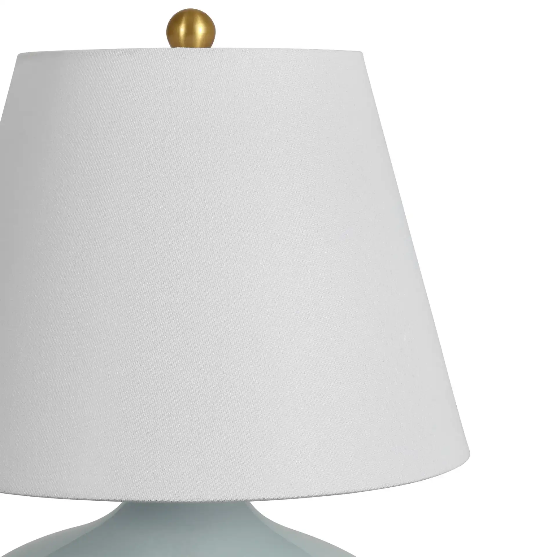Waneta Ceramic Table Lamp in Light Blue / White in a styled room